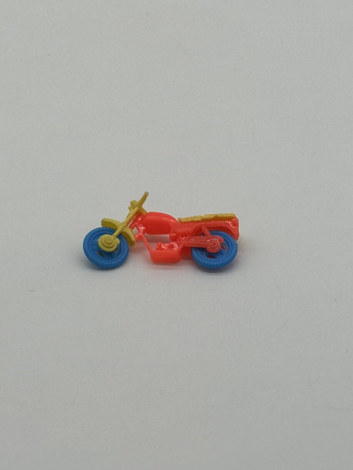 Vintage Red Plastic Motorcycle Toy Blue Moving Wheels