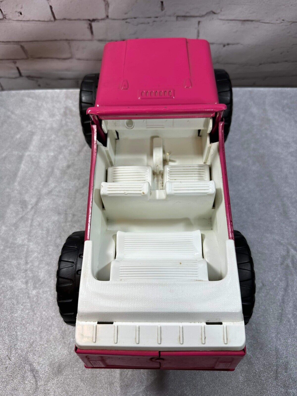 Tonka Stump Jumper lifted Jeepster pink w/white top nice shape vintage