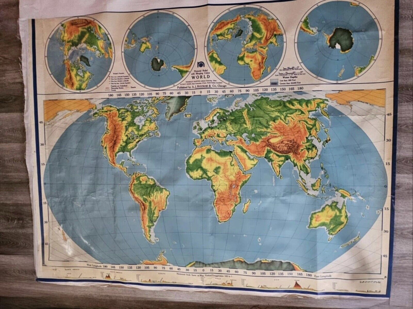 1960 A.J. Nystrom Pictorial Relief Map of the World with merging colors PR98