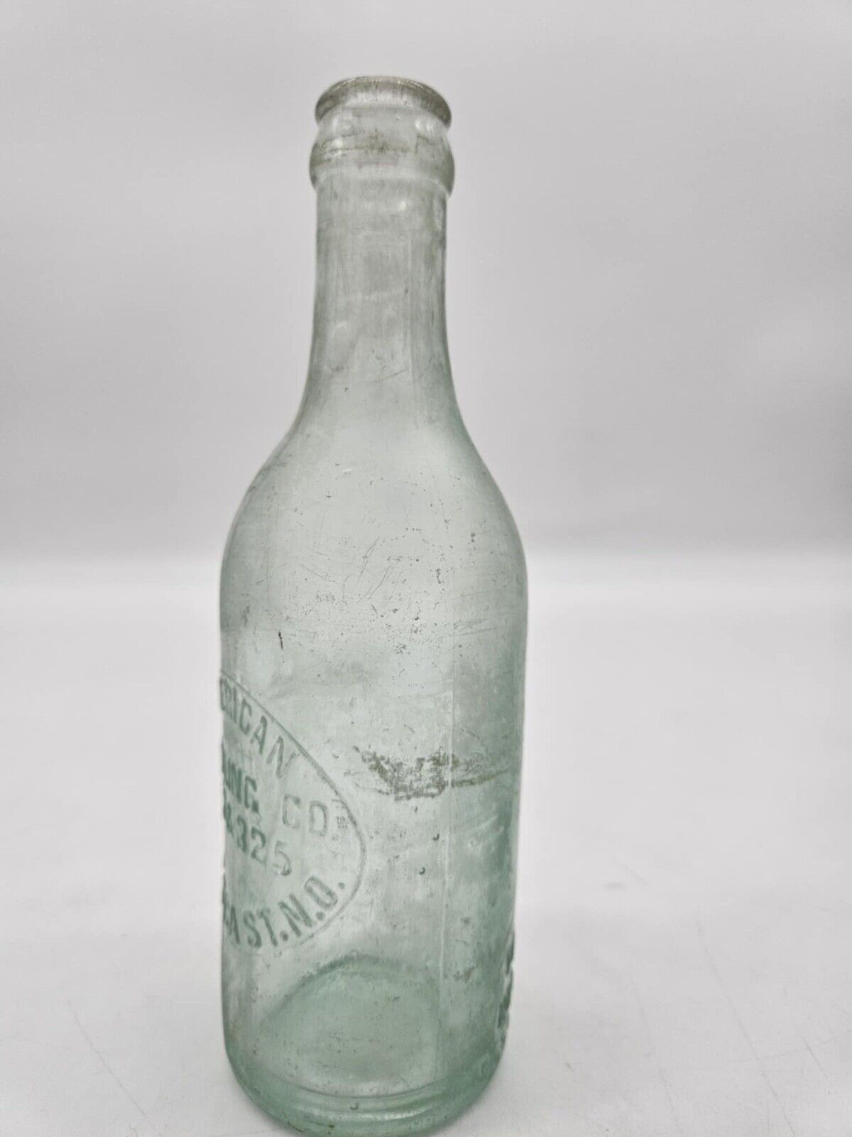 ANTIQUE BOTTLE AMERICAN BOTTLING COMPANY #323 & 325 CLEAR GLASS 7 FL. OZ.