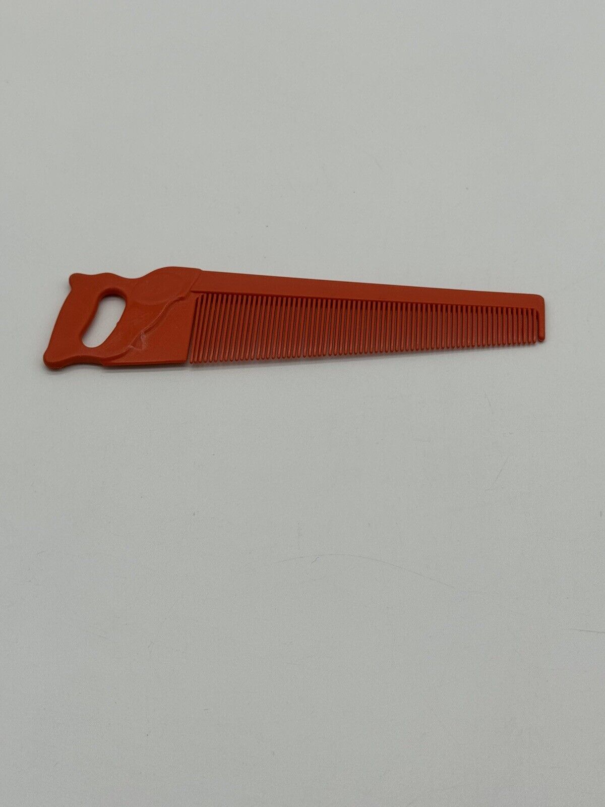 Vintage Orange Saw Comb TNO 006