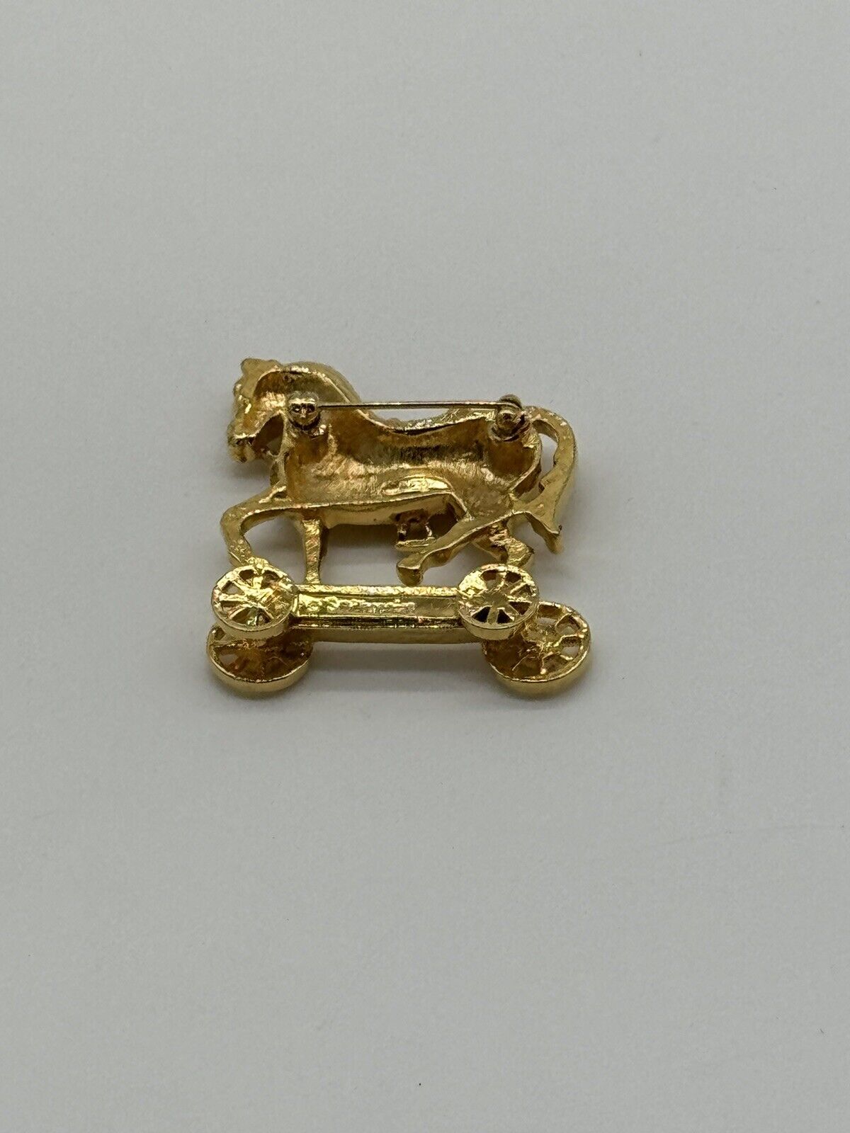 Avon Smithsonian Horse On Wheels Brooch With  Rhinestones Gold Rhodium Plated