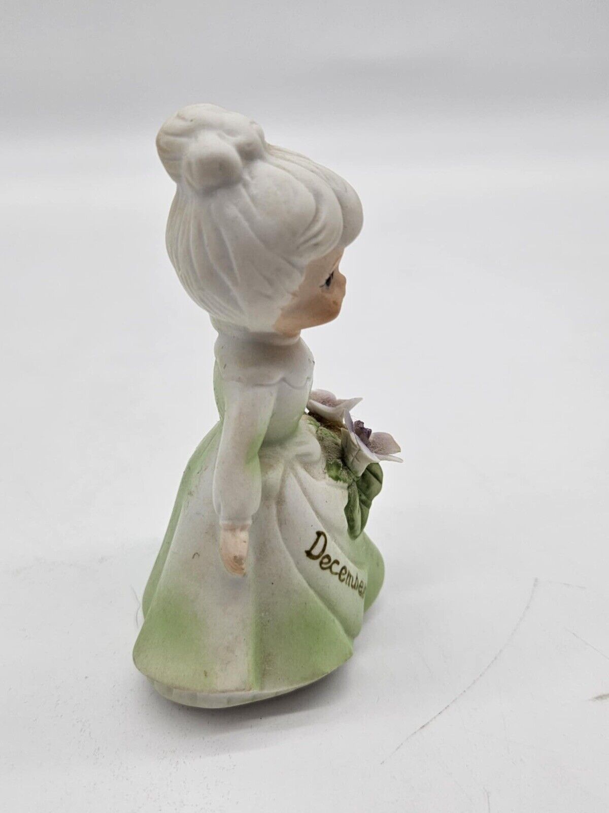 Adorable Vintage Lefton Green December Birthday Girl With Flowers 4”