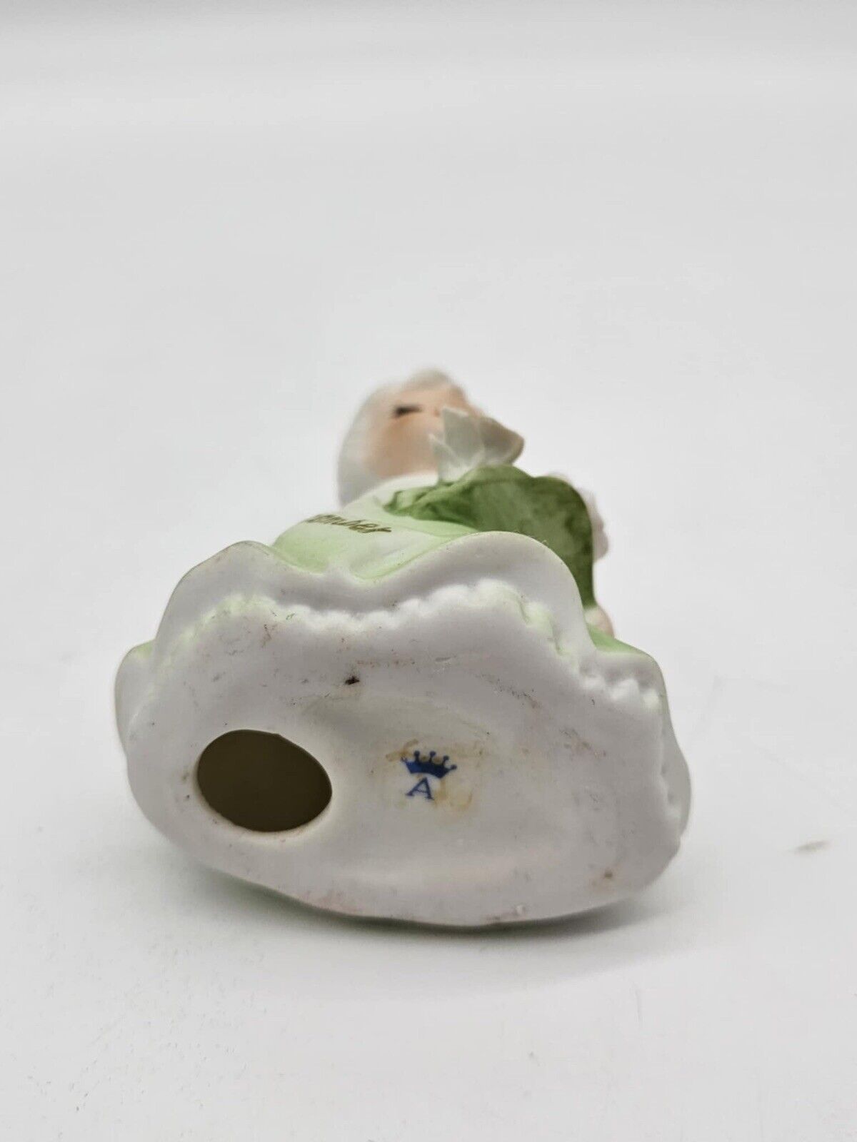 Adorable Vintage Lefton Green December Birthday Girl With Flowers 4”