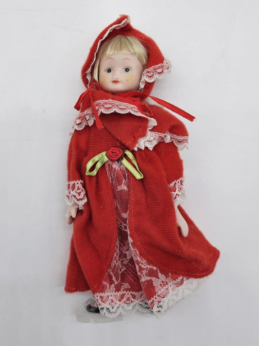 Bisque Porcelain 9" Doll Wearing Red Dress W/Shawl & Hat Black Painted On Shoes