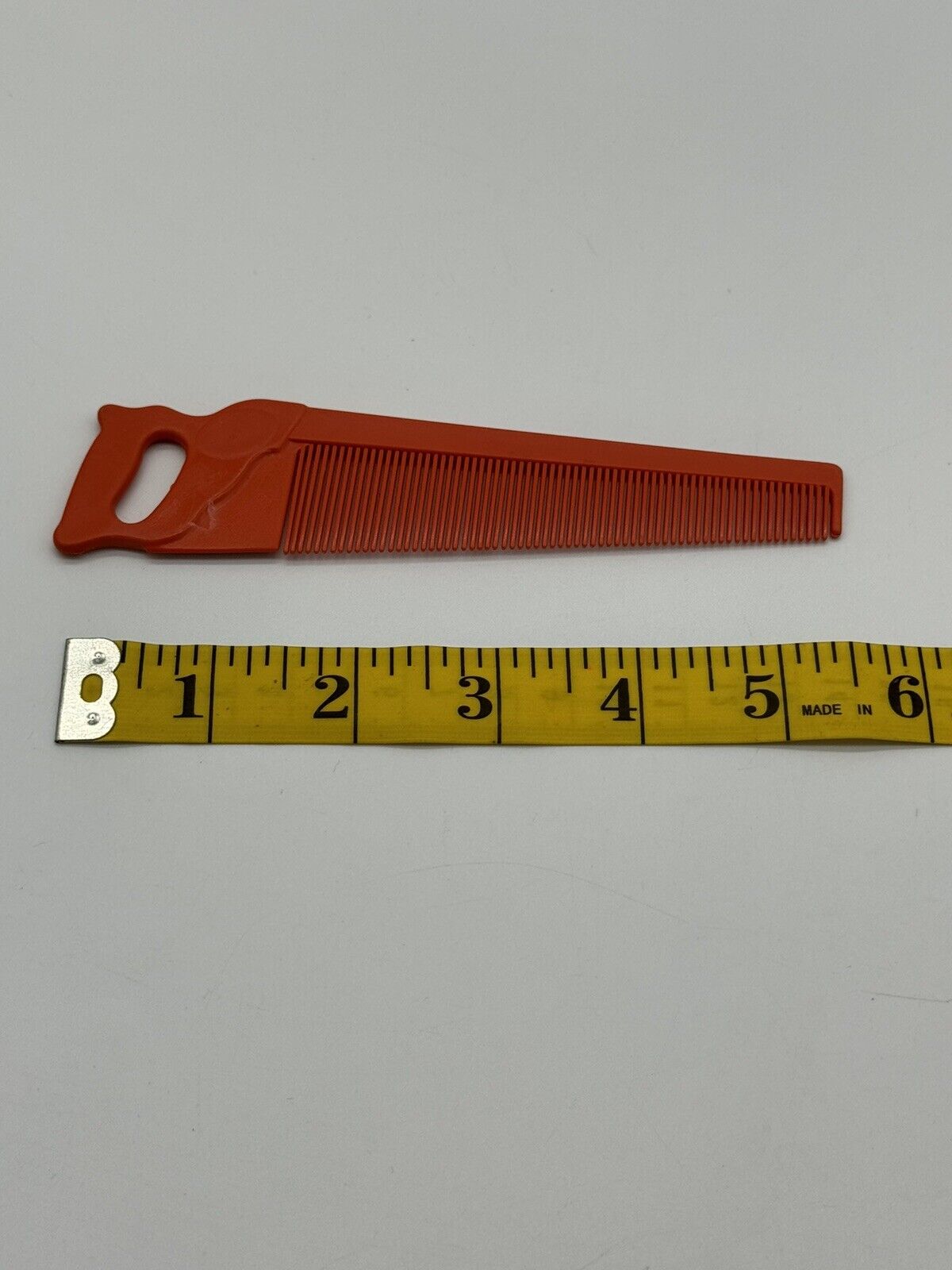 Vintage Orange Saw Comb TNO 006