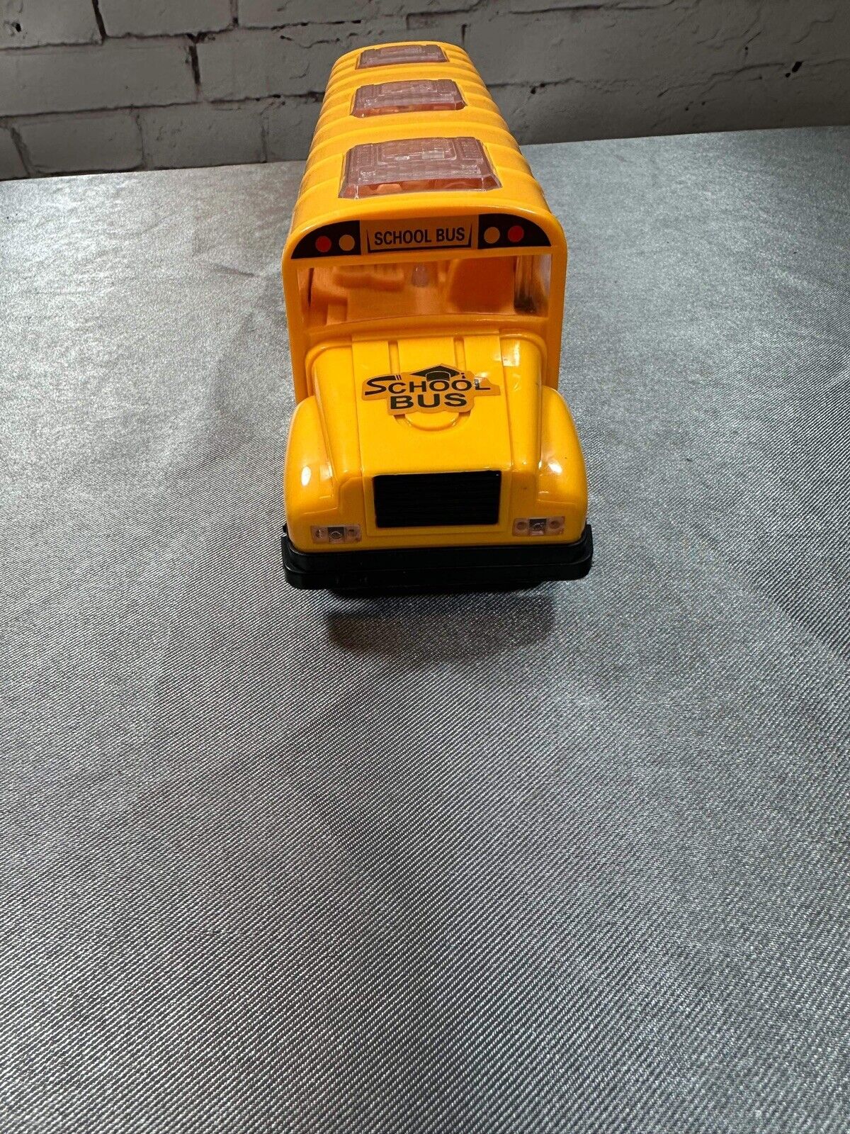 School Bus with Flashing LED Lights and Bus Sounds. Bump and Go Action VTY