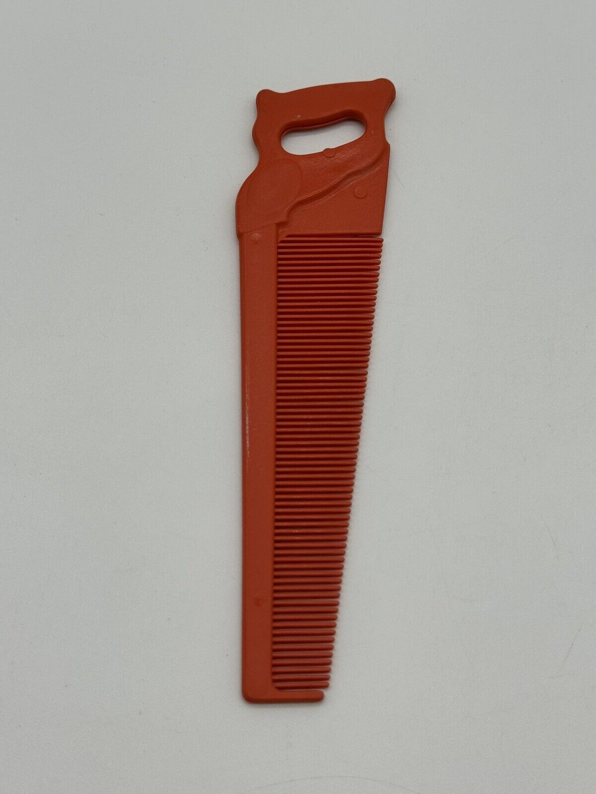 Vintage Orange Saw Comb TNO 006