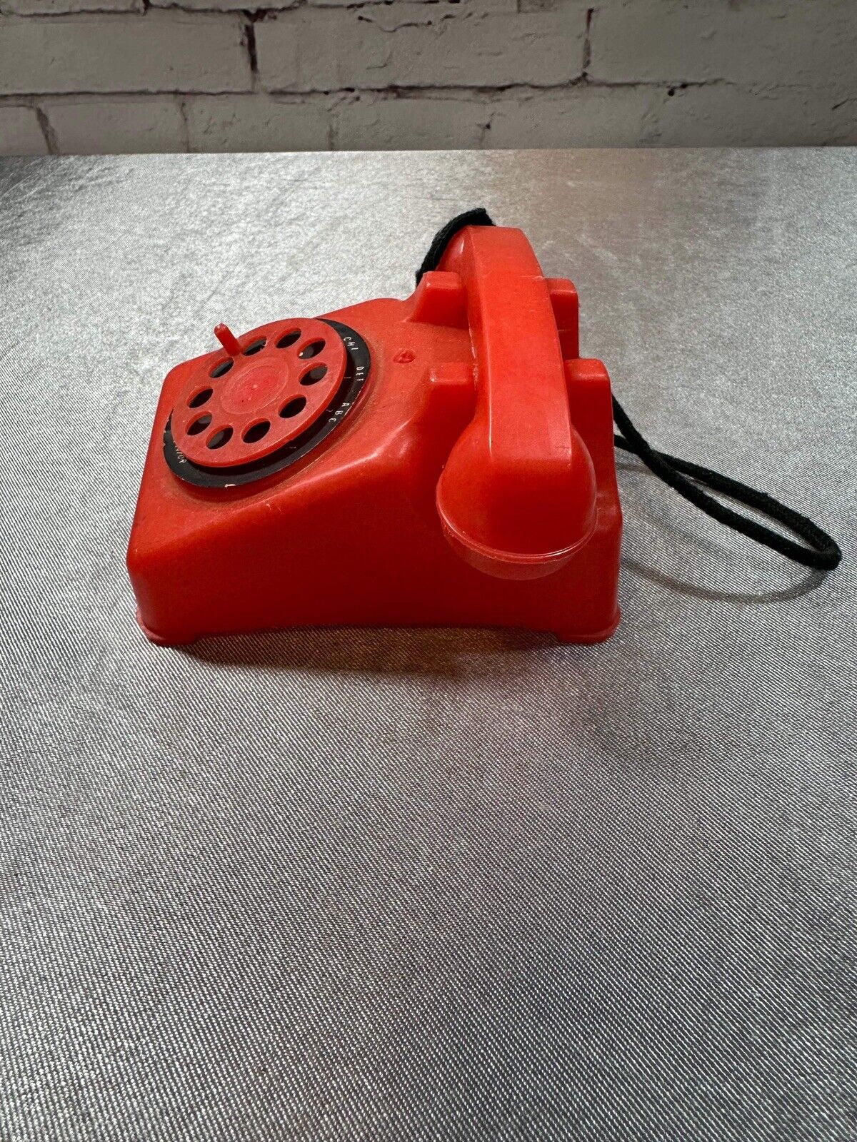 VINTAGE THE STEEL STAMPING CO. TOY ROTARY PHONE LORAIN O RED TELEPHONE VTY 003