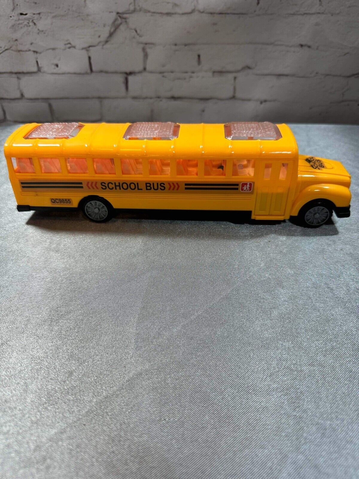 School Bus with Flashing LED Lights and Bus Sounds. Bump and Go Action VTY