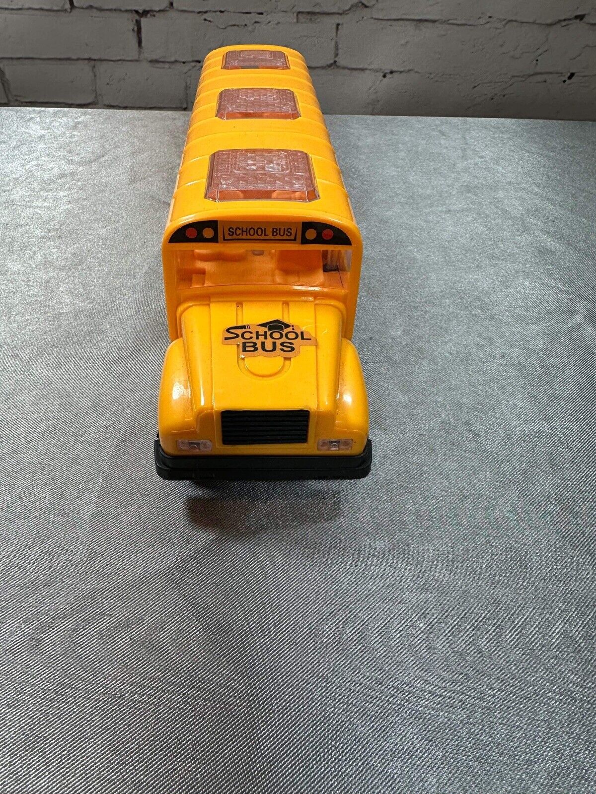 School Bus with Flashing LED Lights and Bus Sounds. Bump and Go Action VTY
