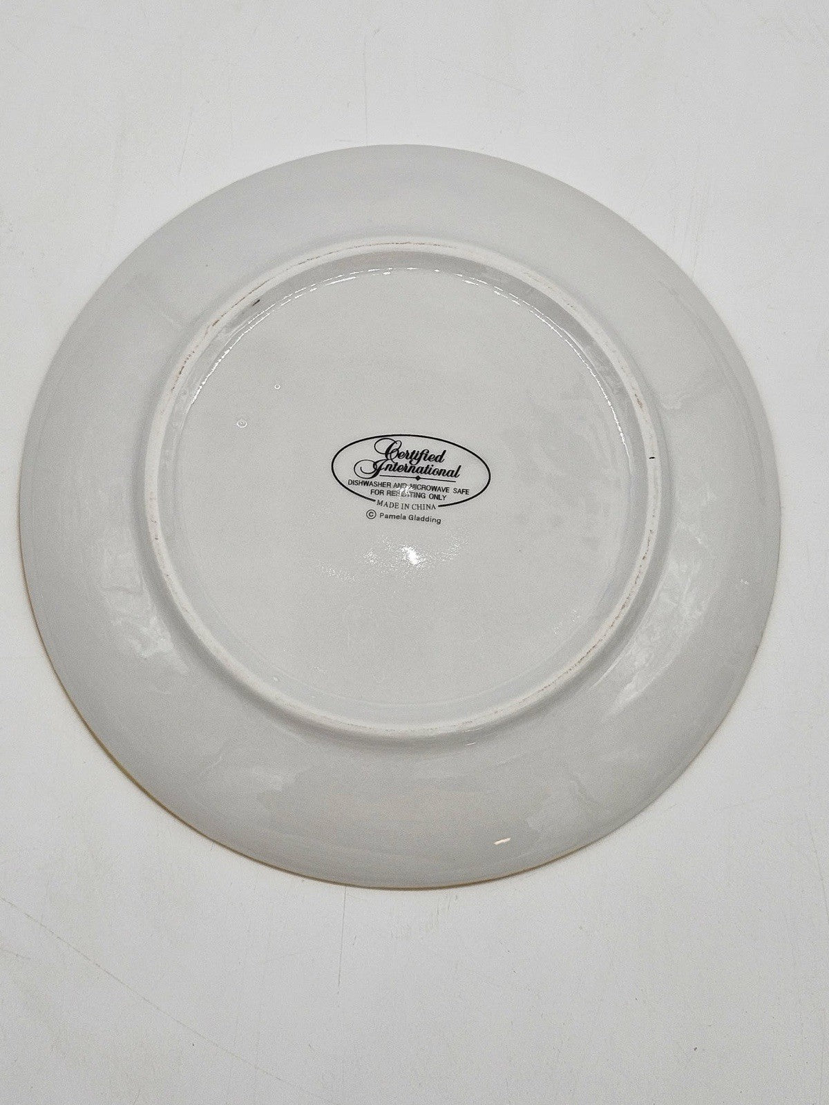 Certified International Pamela Gladding 8" Decorative Plate Santa with Gift Bags