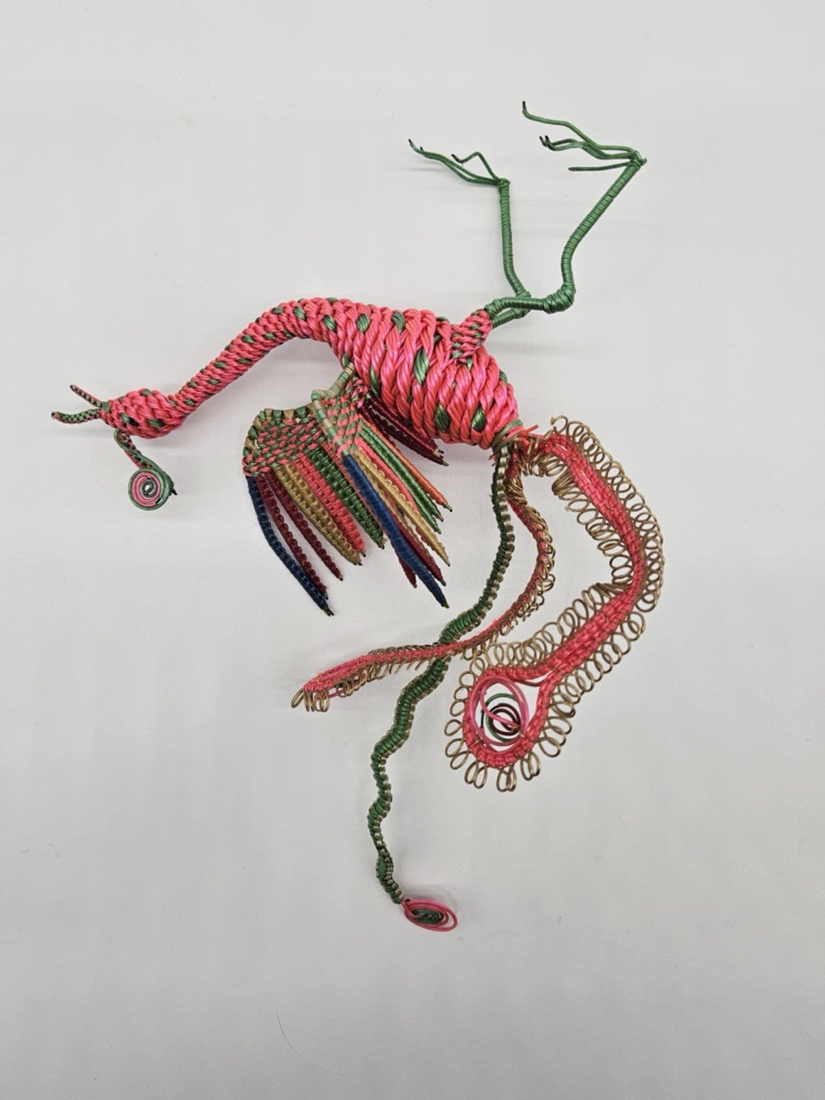 vintage, handcrafted peacock or phoenix figurine