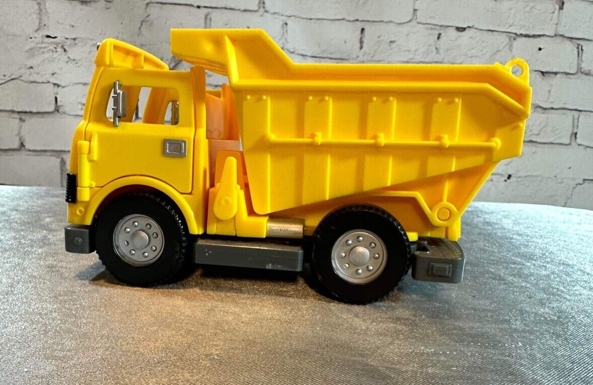 FISHER PRICE DUMP TRUCK PLASTIC 7"X 4" LEVER ACTION POPS UP BACK VTY
