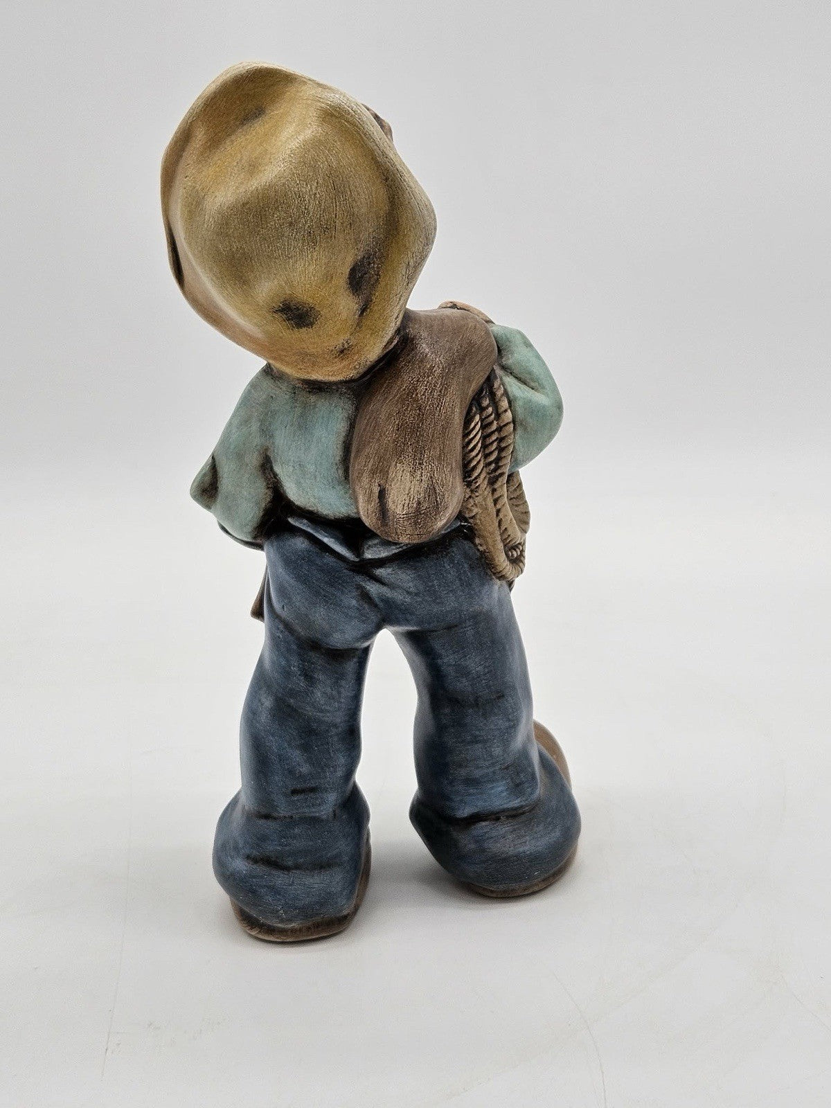 Vintage Hummel Style Boy Figurine with Sack & Ripped Pants
