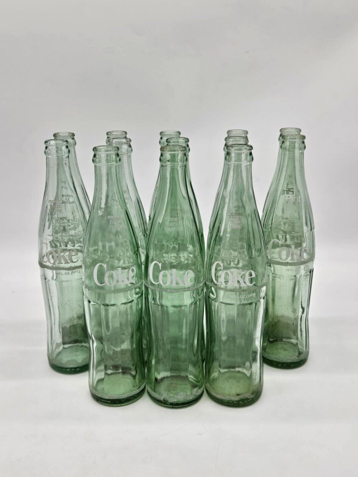 Lot of 13 Vintage 10oz. Coca-Cola 1960's Glass Bottles