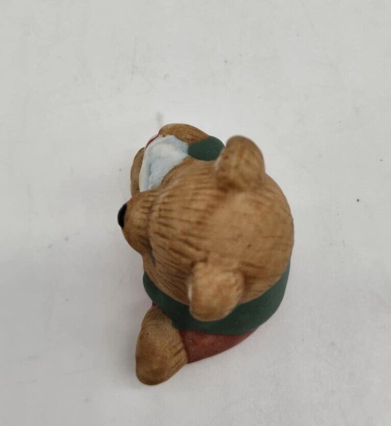Vintage Homoco Baby Bear Holding Toy Horse Figurine