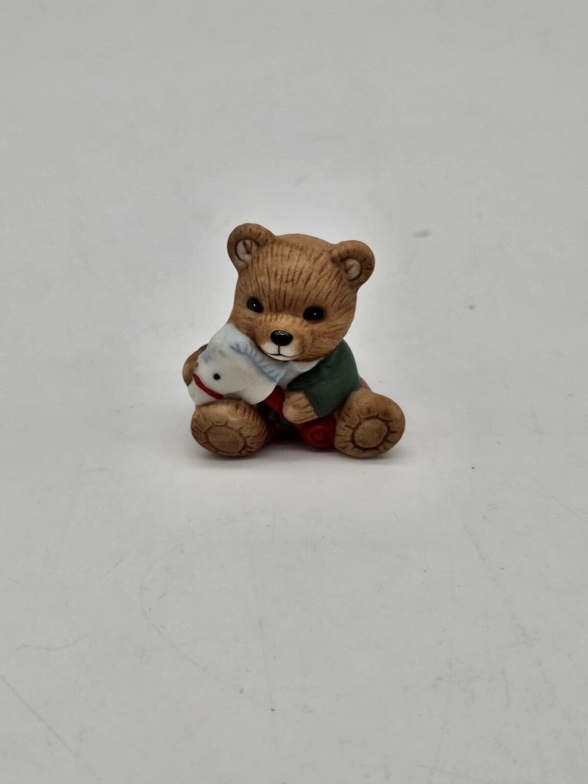 Vintage Homoco Baby Bear Holding Toy Horse Figurine