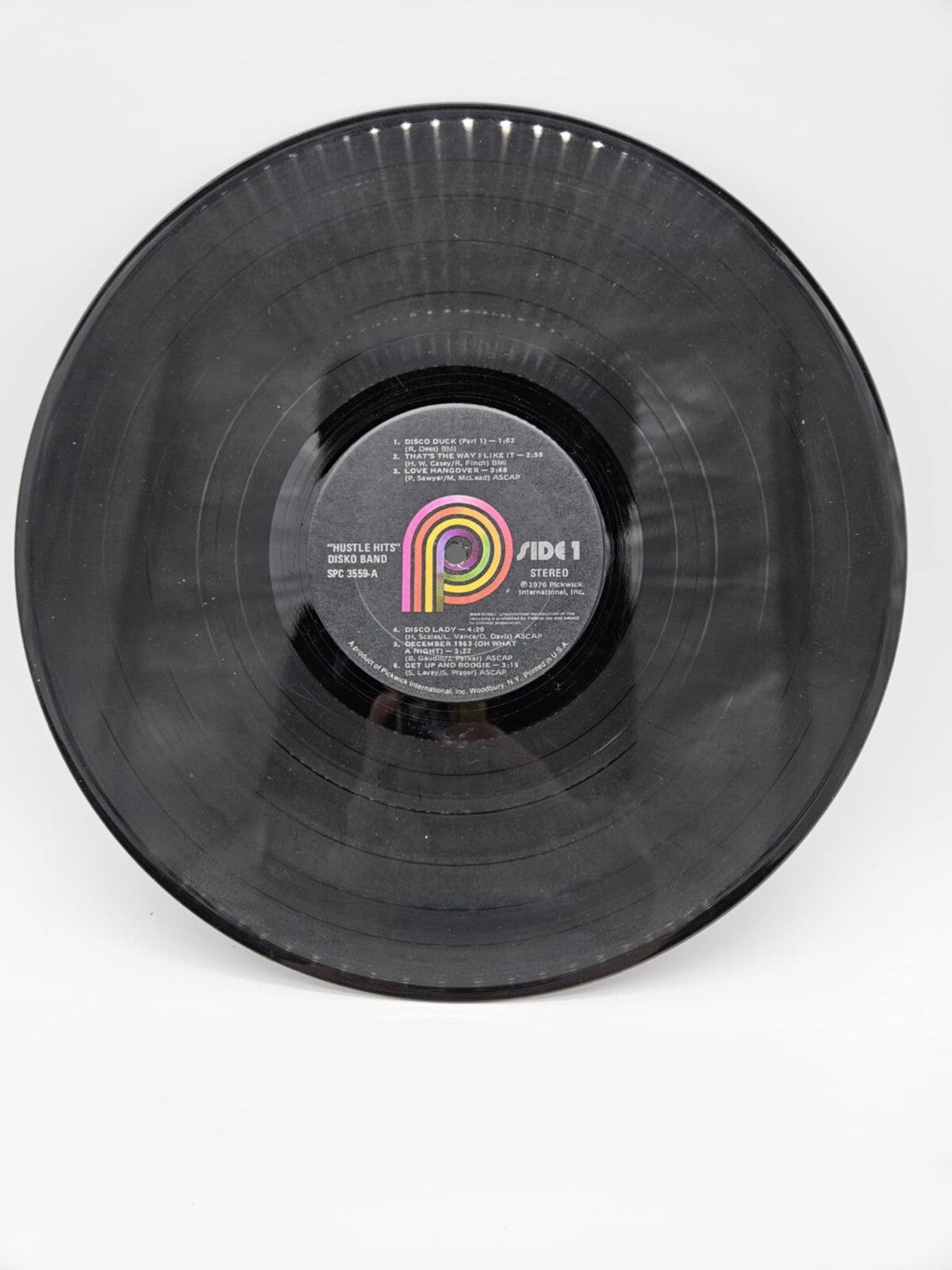 HUSTLE HITS, DISCO DUCK & OTHERS HOW TO HUSTLE LP SPC-3559 ORIGINAL 1976