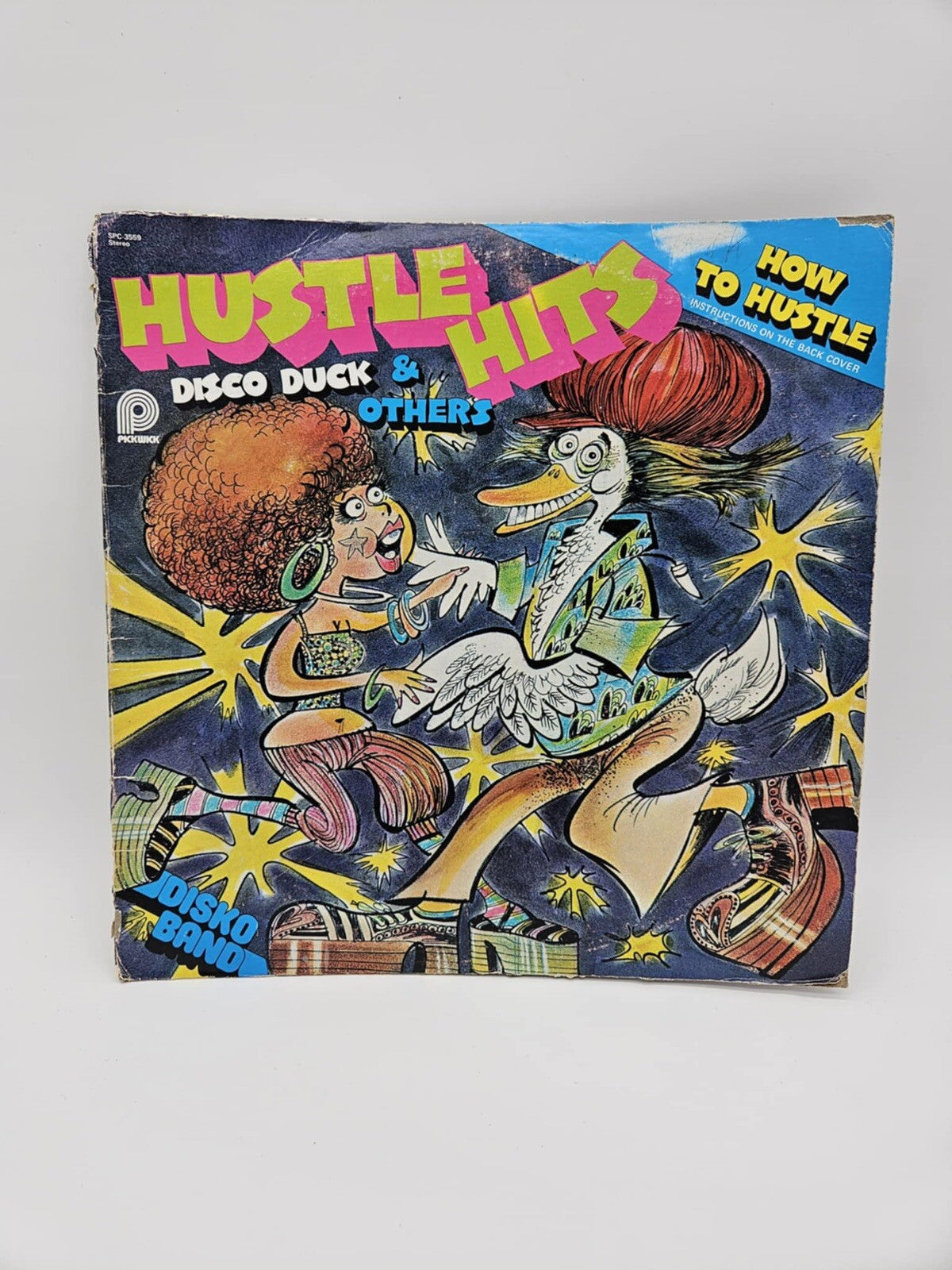 HUSTLE HITS, DISCO DUCK & OTHERS HOW TO HUSTLE LP SPC-3559 ORIGINAL 1976