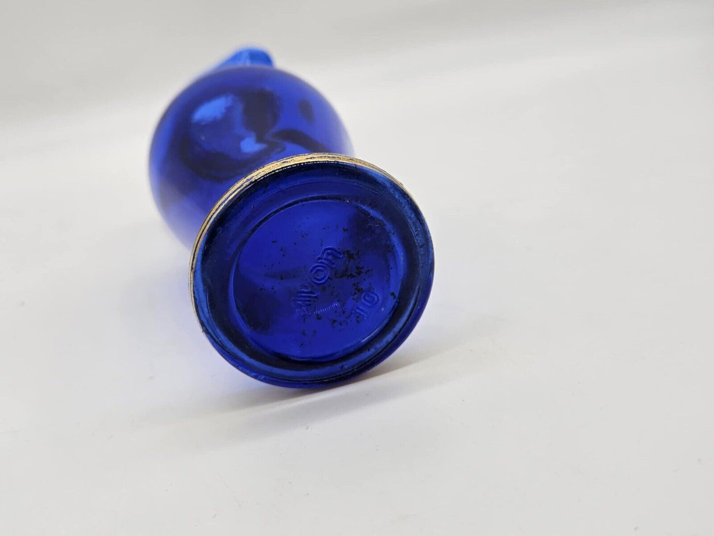 Vintage Avon Bottle With Plugs & Gold Ornament Made of Glass Cobalt Blue # 10