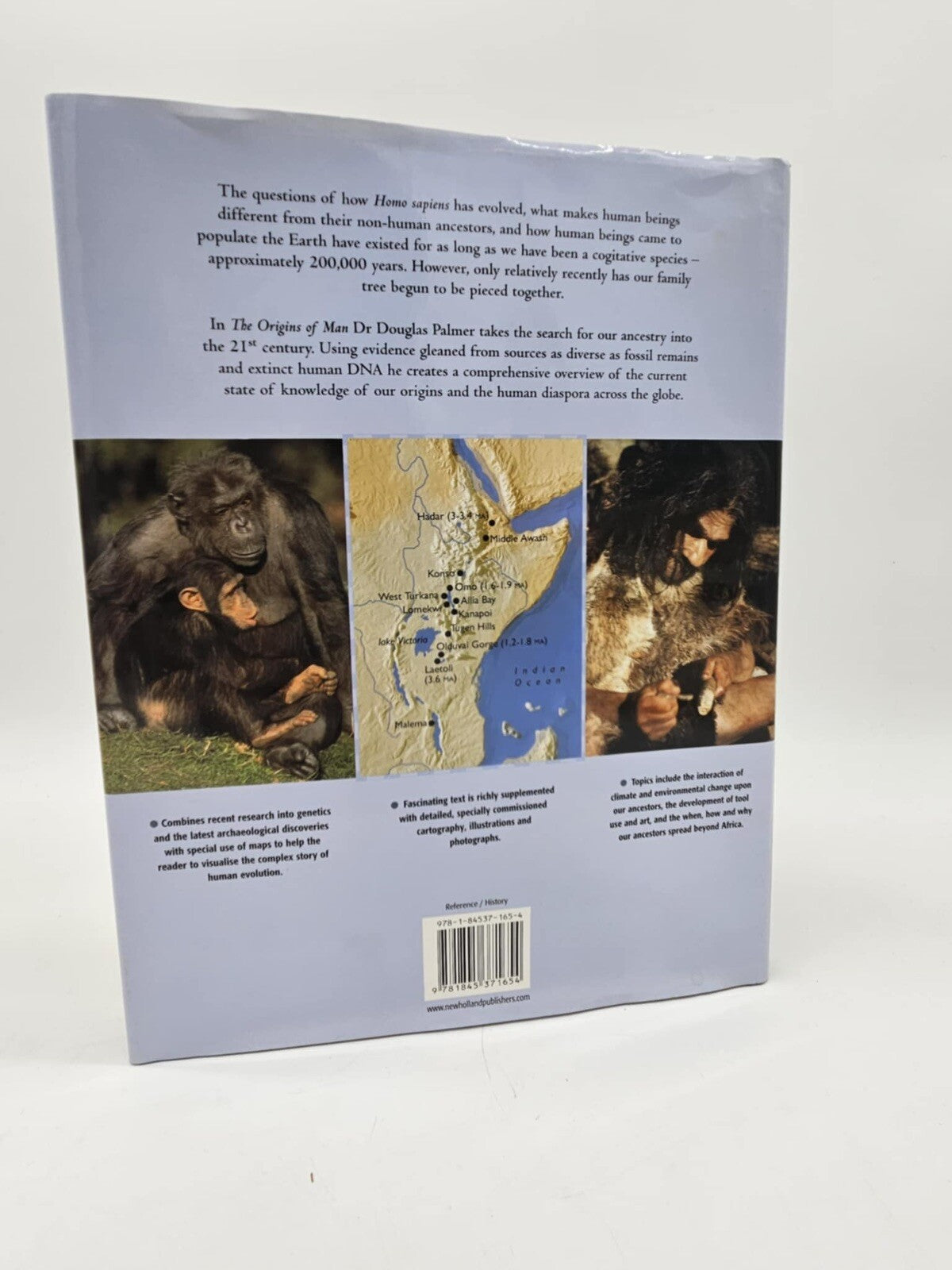 The Origins of Man: An Illustrated History of Human Evolution - Hardcover - GOOD