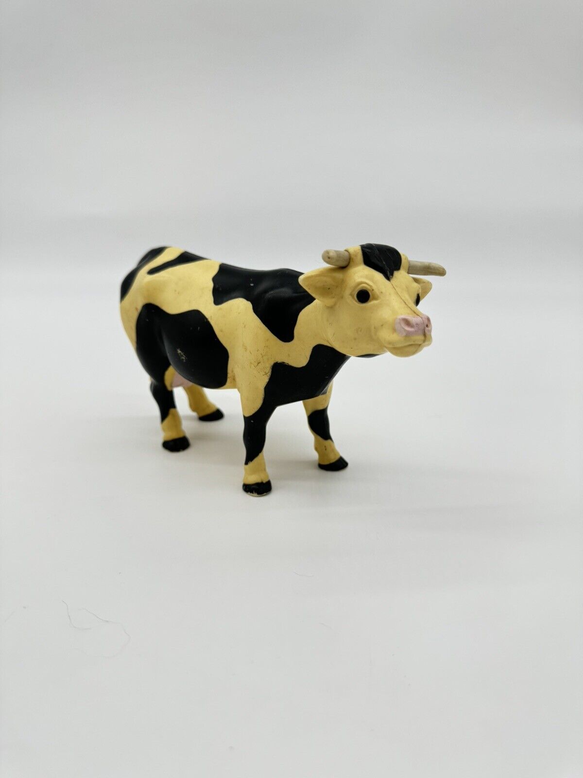 Vintage Plastic Cow Figure Toy Black And White Farm 1996 4"1/4 tall. 7"1/4 long.