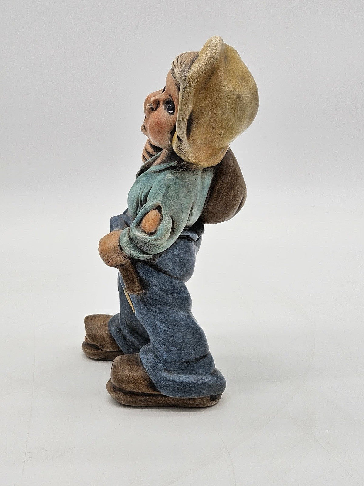 Vintage Hummel Style Boy Figurine with Sack & Ripped Pants