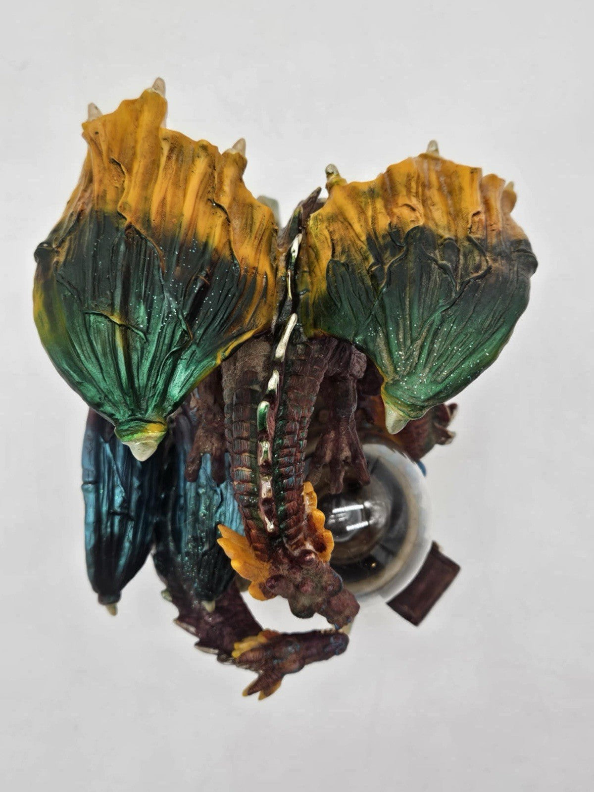 Green and Purple/Red Dragons Fighting over Lighted Orb of Power