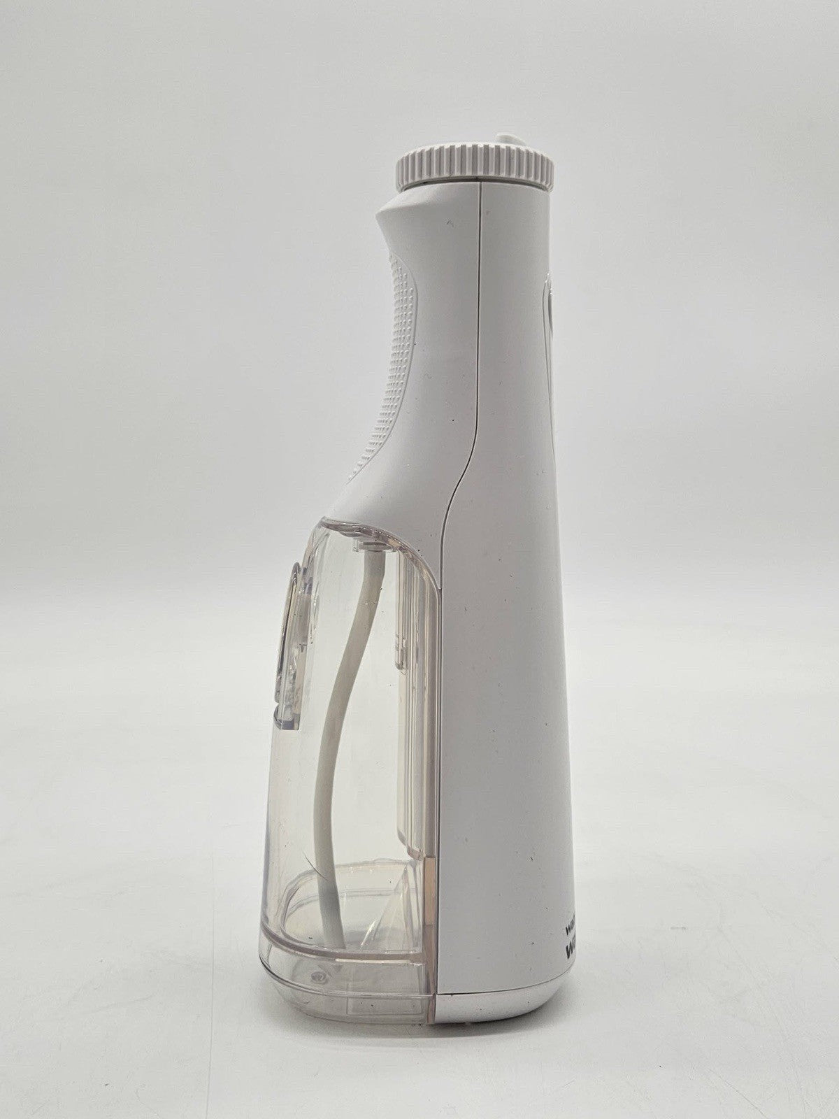 Waterpik Cordless Water Flosser White w Tips Charger Travel Bag Preowned