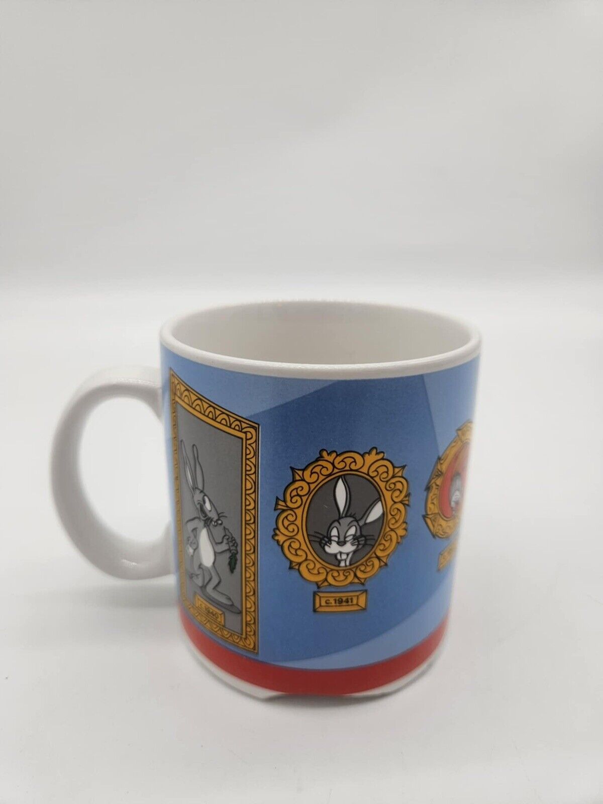 Looney Tunes Bugs Bunny thru the years Mug cup WB Warner Brothers 1989 Applause