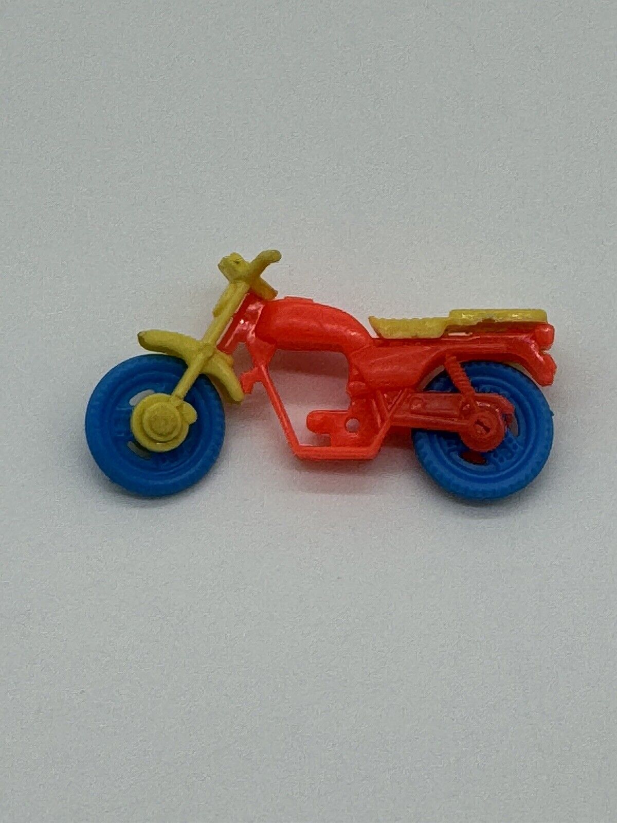 Vintage Red Plastic Motorcycle Toy Blue Moving Wheels