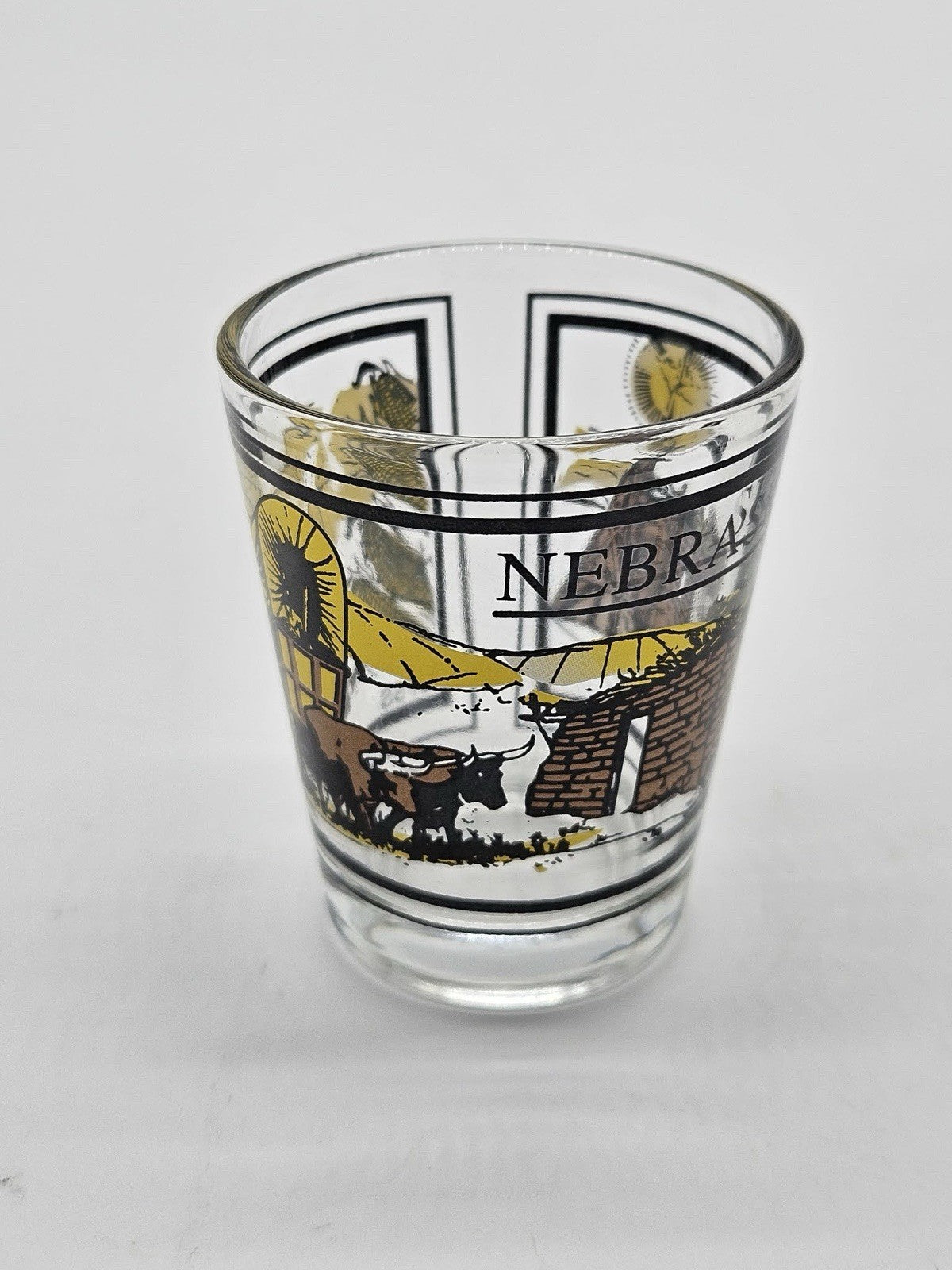 Nebraska Covered Wagon Wheat Corn Rising Sun Scene On Clear Standard Shot Glass
