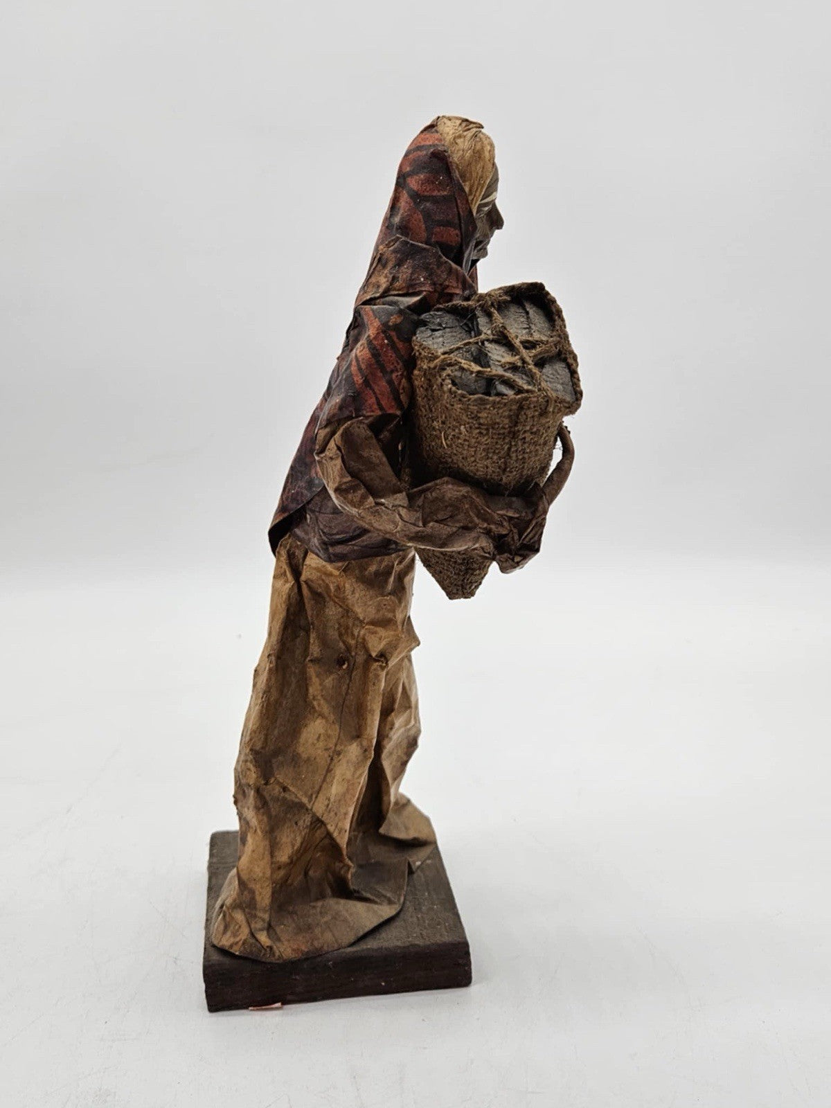 Vintage Mexican folk art paper Mache Old Woman Holding Burlap Sack