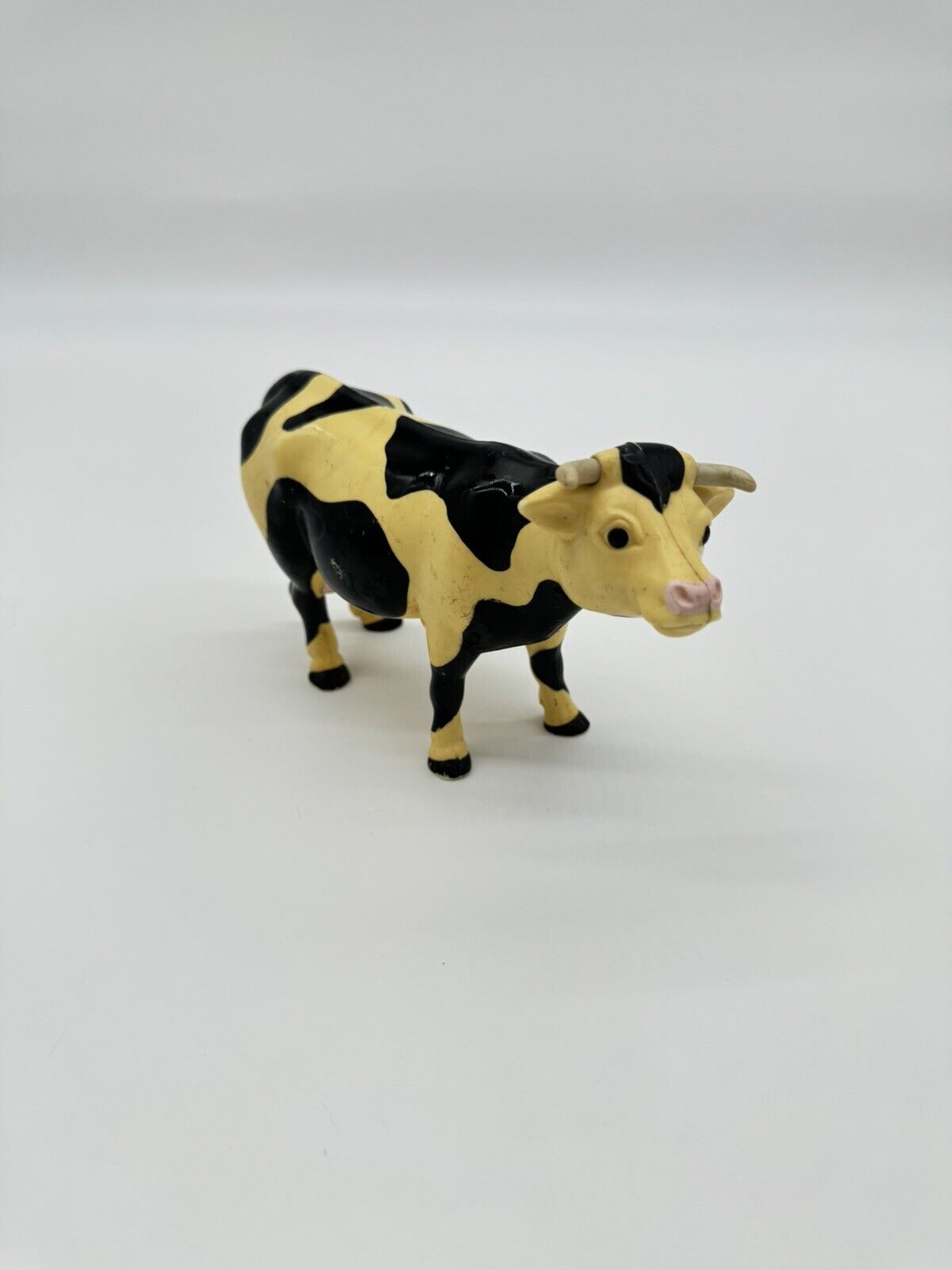 Vintage Plastic Cow Figure Toy Black And White Farm 1996 4"1/4 tall. 7"1/4 long.