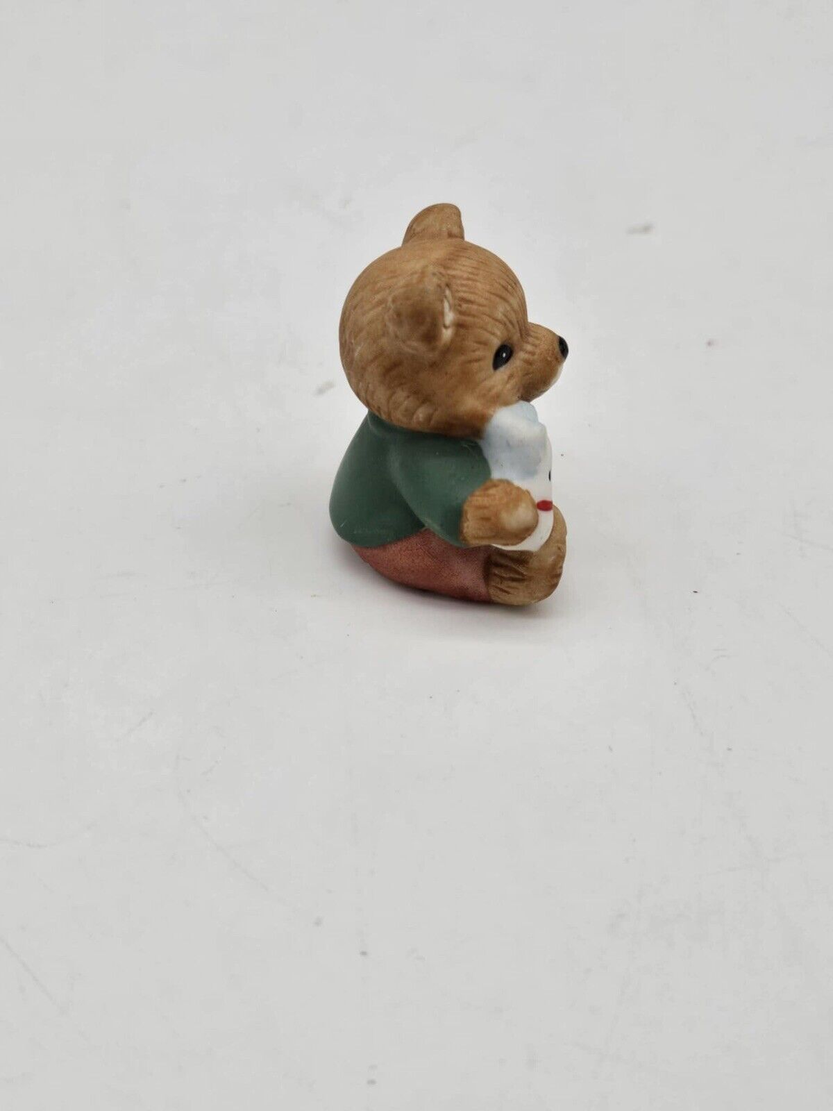 Vintage Homoco Baby Bear Holding Toy Horse Figurine
