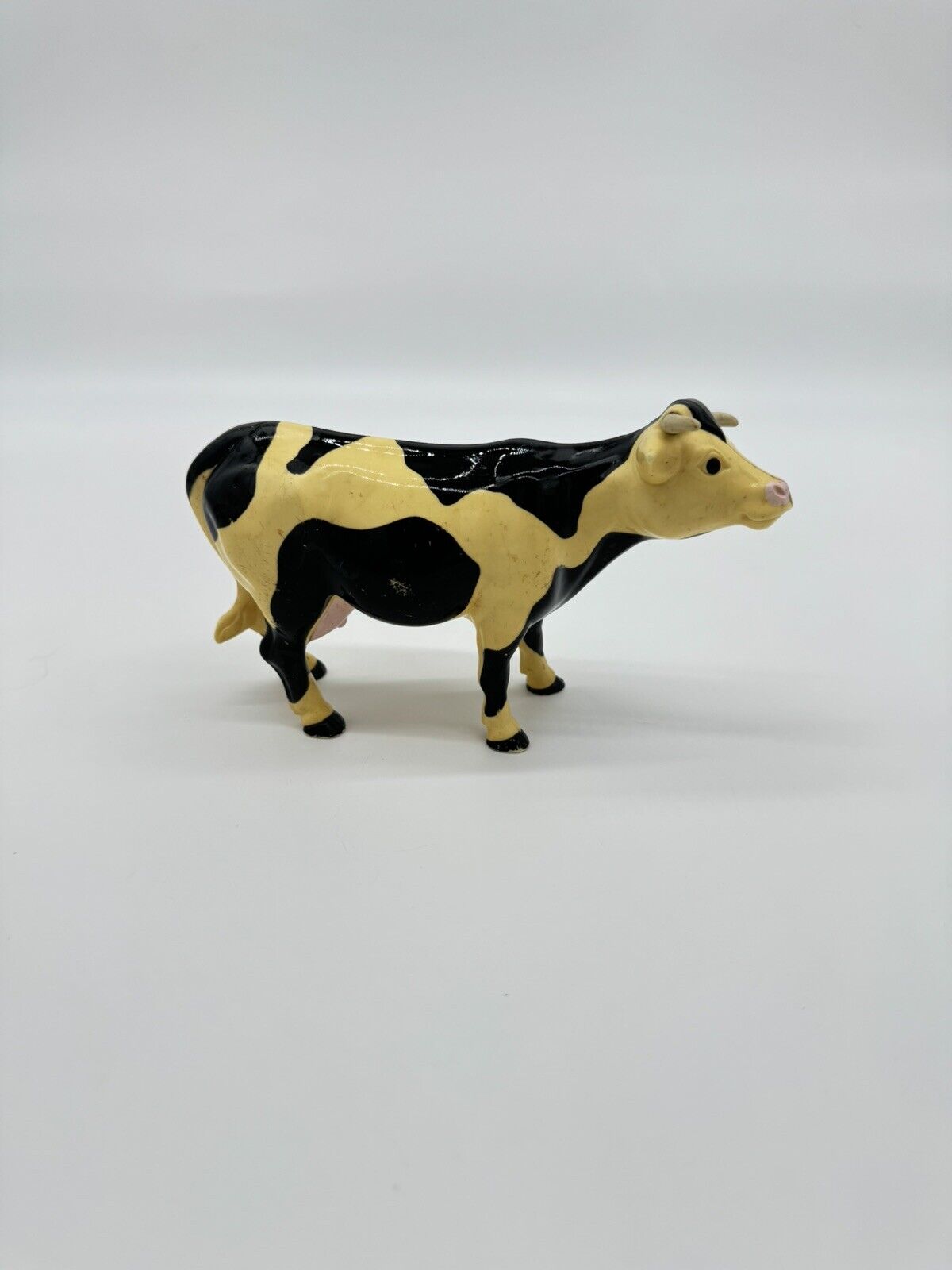 Vintage Plastic Cow Figure Toy Black And White Farm 1996 4"1/4 tall. 7"1/4 long.