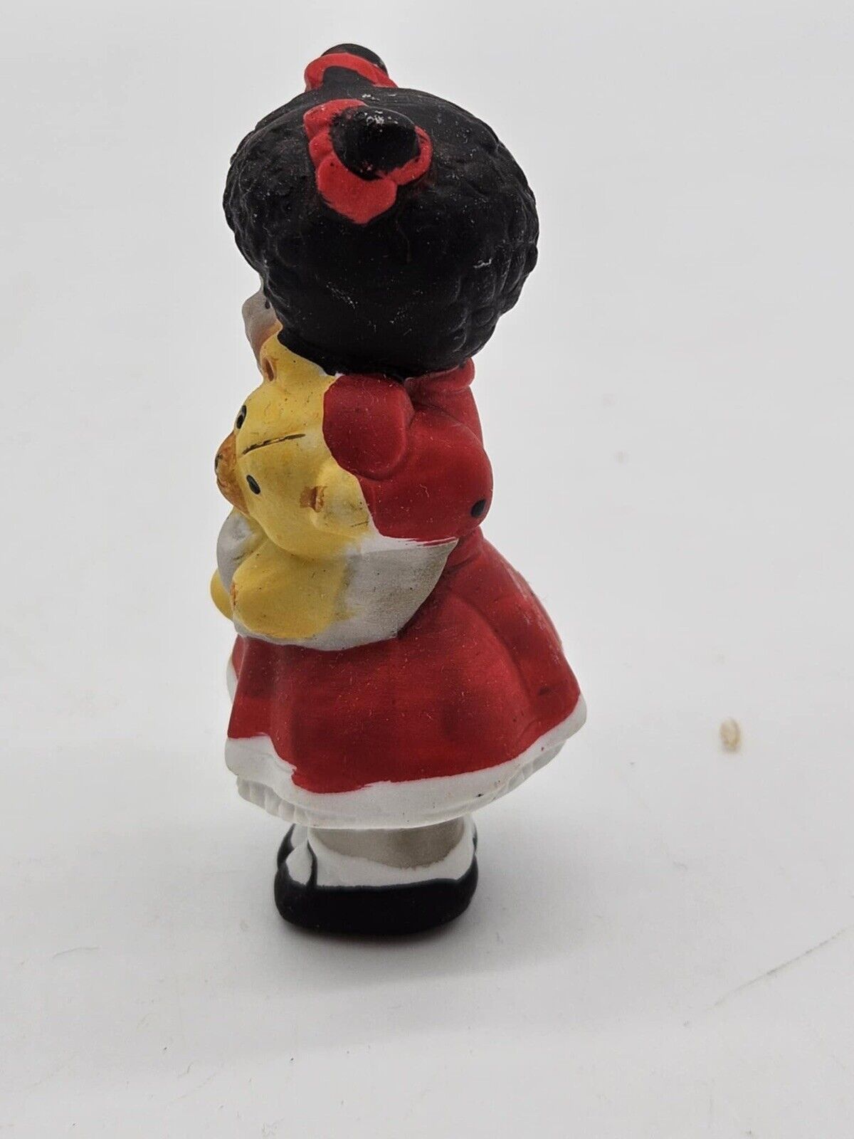 VINTAGE HAND PAINTED BISQUE GIRL HOLDING A TEDDY BEAR 3” ORNAMENT  (CB2985)