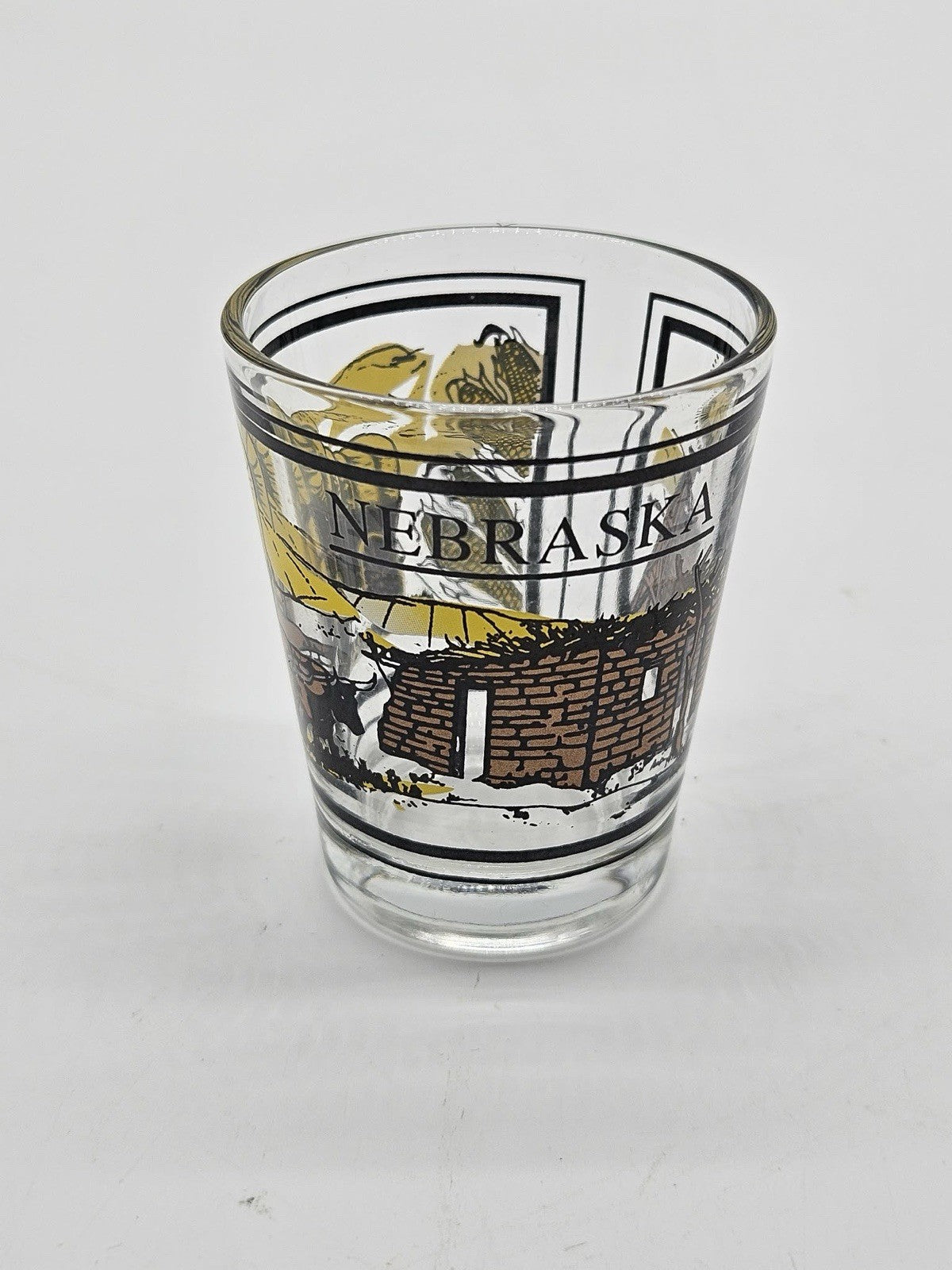 Nebraska Covered Wagon Wheat Corn Rising Sun Scene On Clear Standard Shot Glass