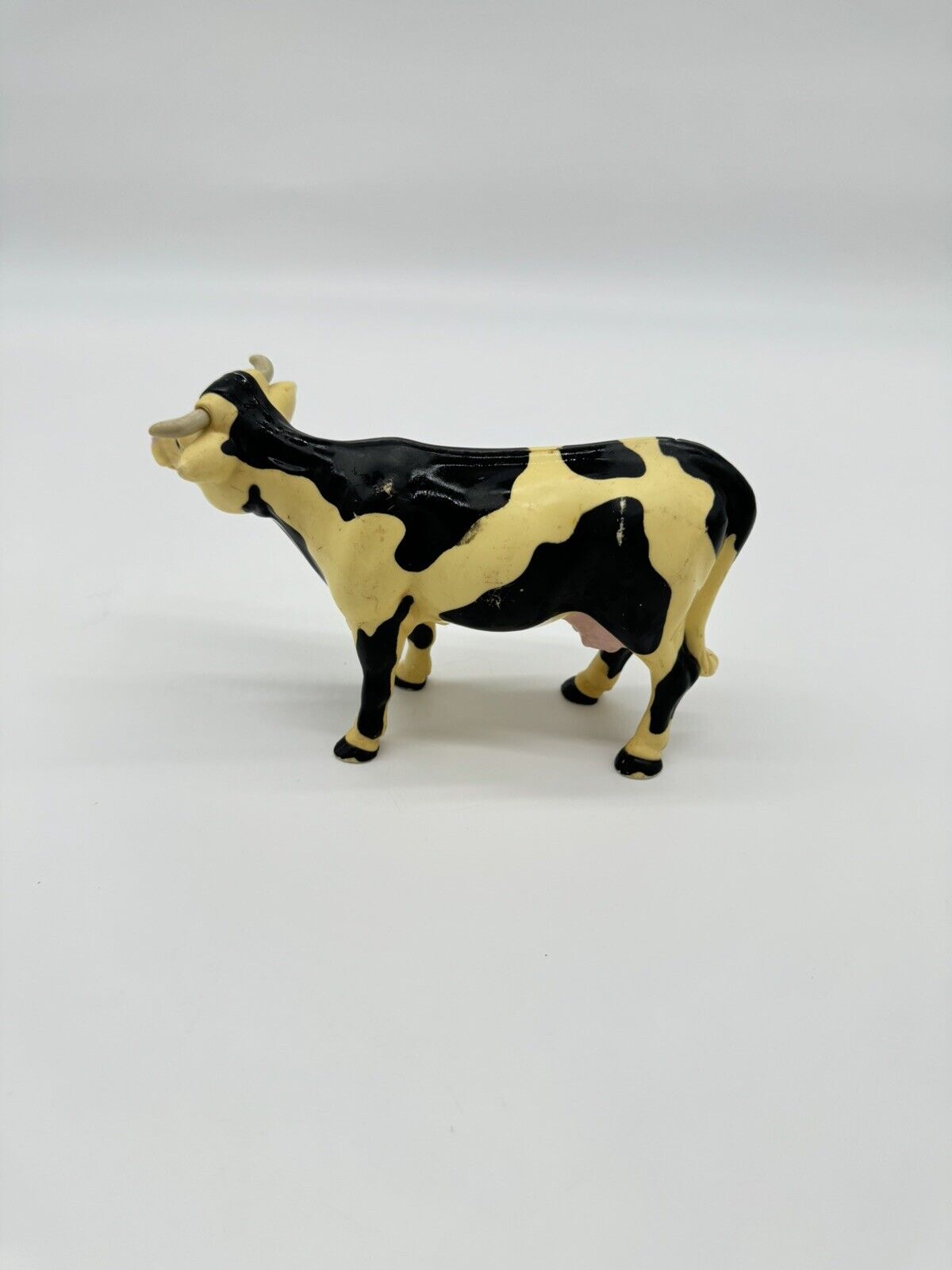 Vintage Plastic Cow Figure Toy Black And White Farm 1996 4"1/4 tall. 7"1/4 long.