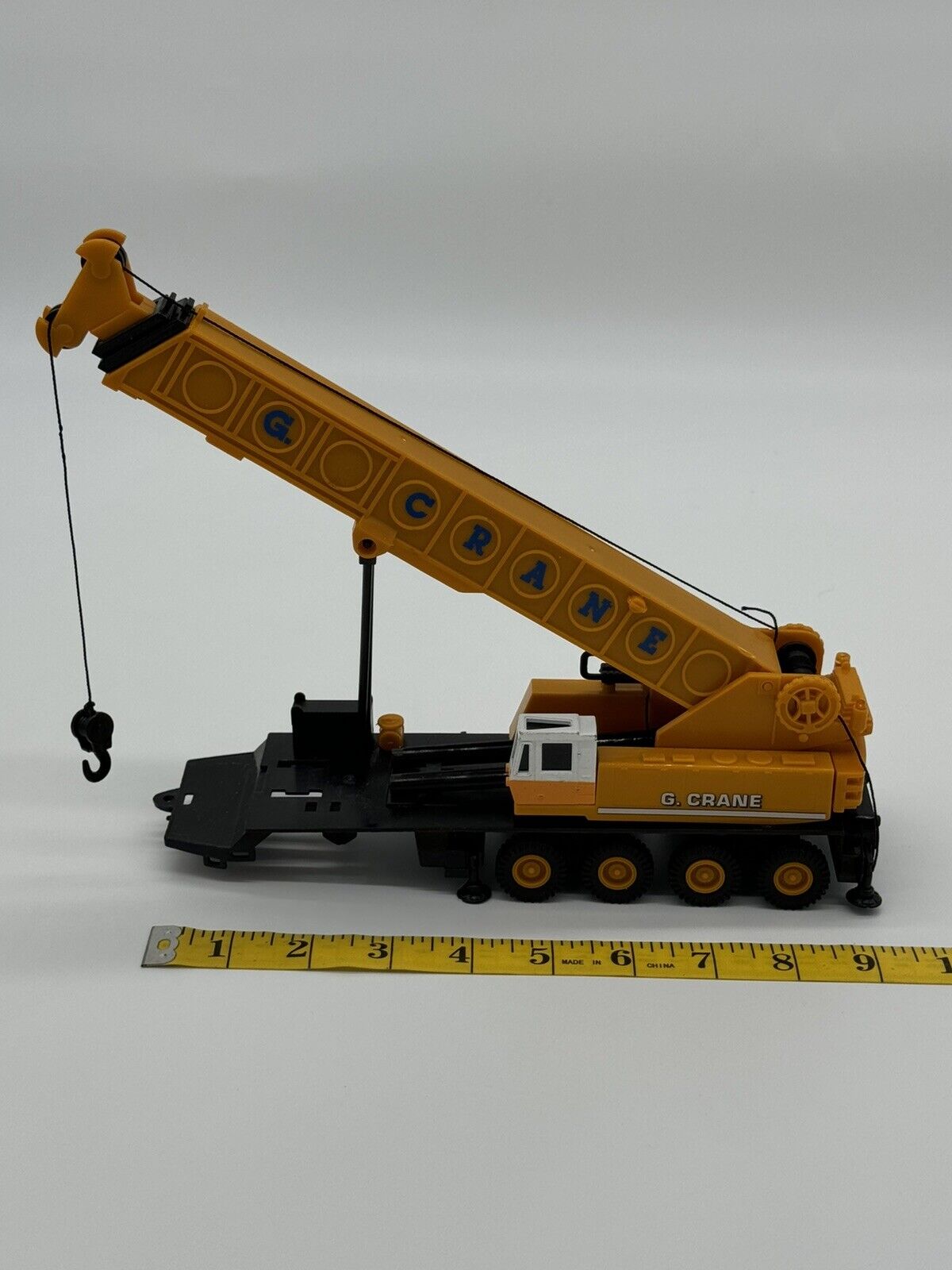 G Crane plastic toy model Yellow crane 11”