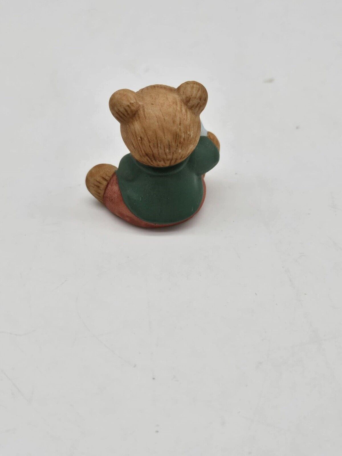 Vintage Homoco Baby Bear Holding Toy Horse Figurine