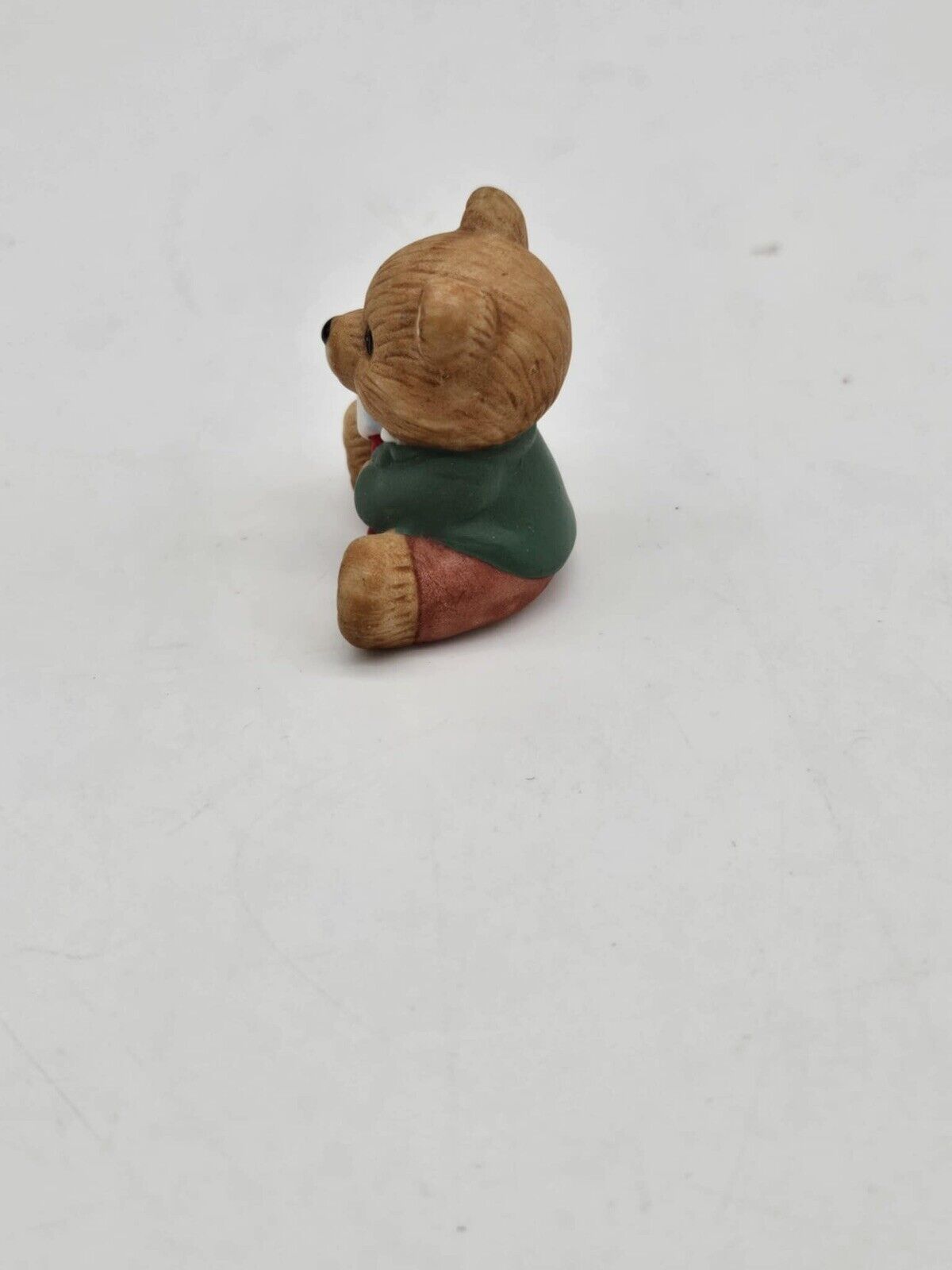 Vintage Homoco Baby Bear Holding Toy Horse Figurine