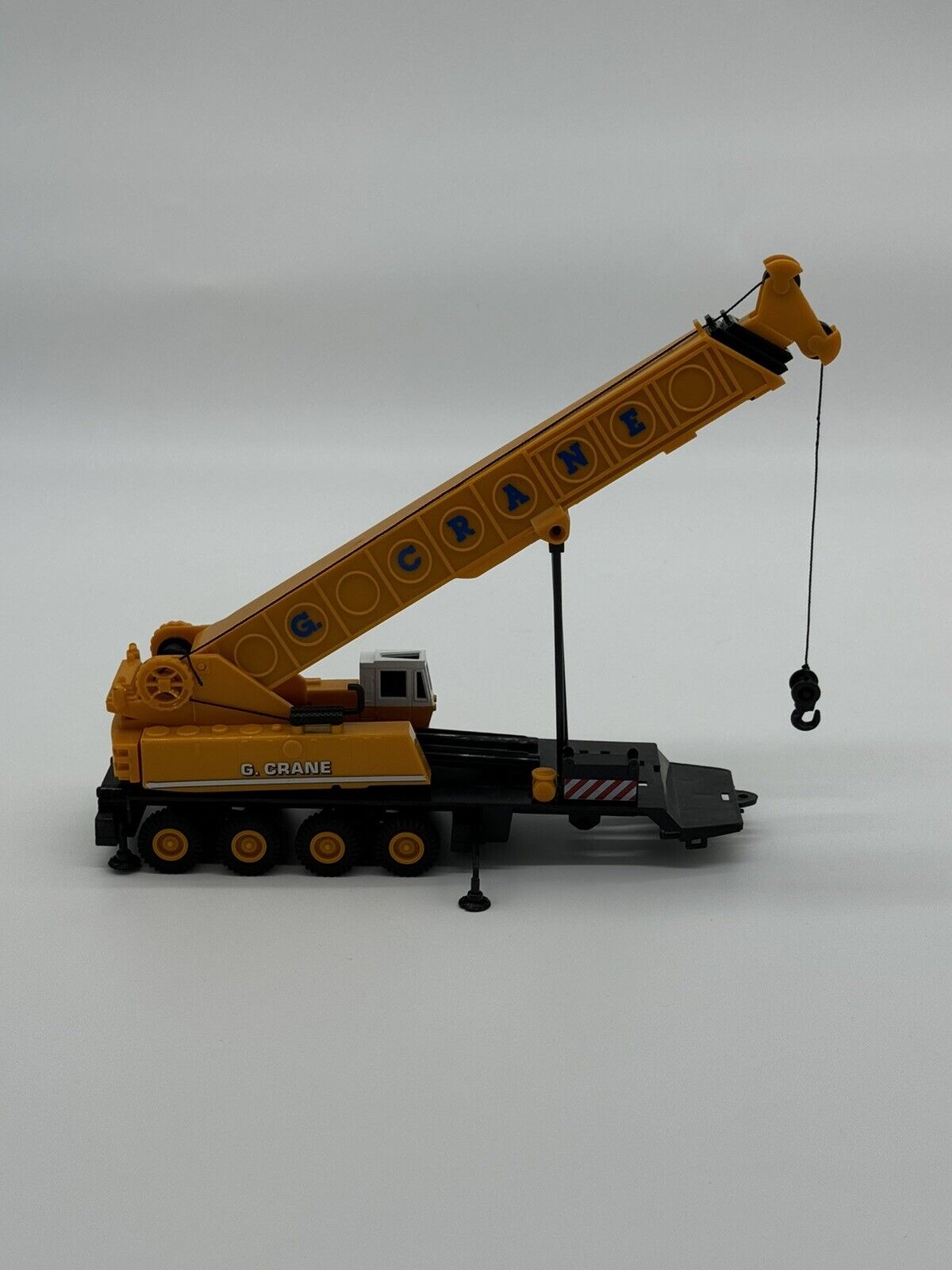 G Crane plastic toy model Yellow crane 11”