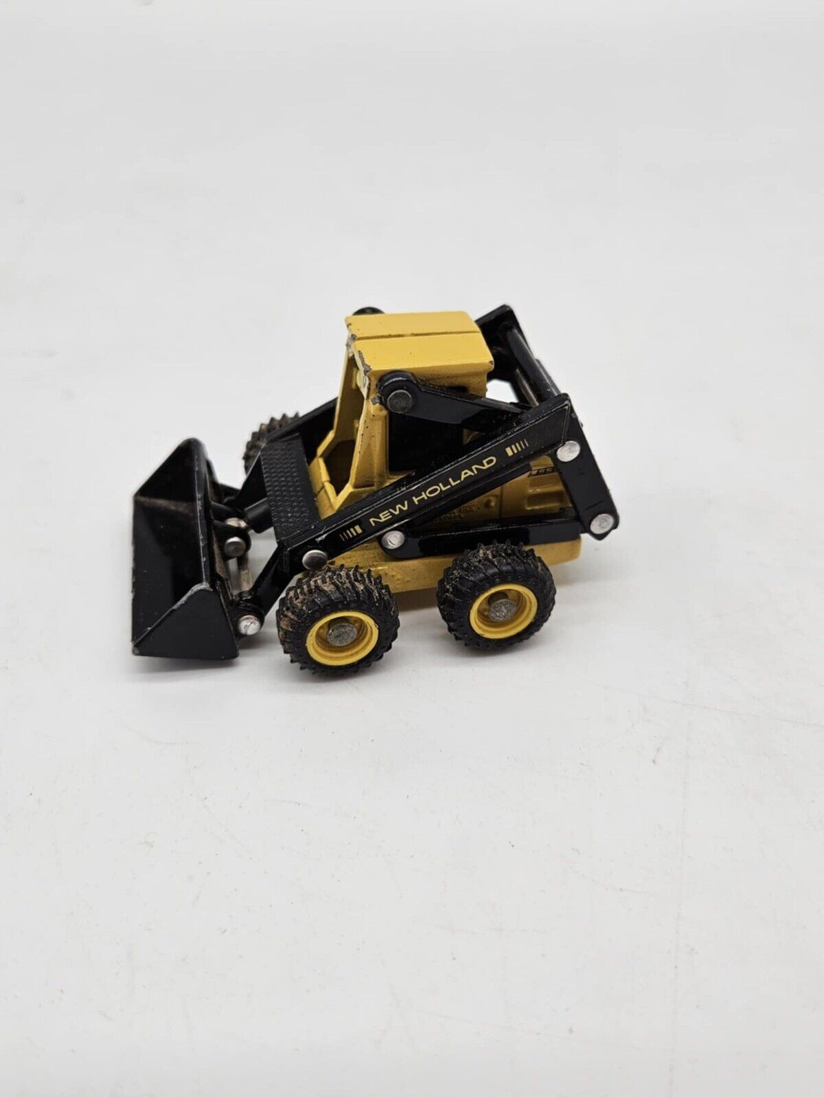 Miniature New Holland Model 555 Skid Steer Front Loader Used DieCast 2.75" Size