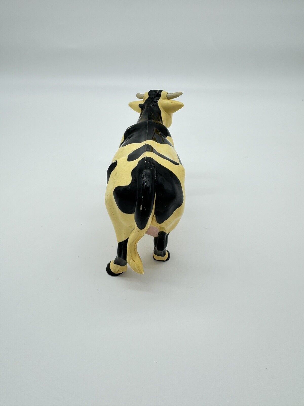 Vintage Plastic Cow Figure Toy Black And White Farm 1996 4"1/4 tall. 7"1/4 long.