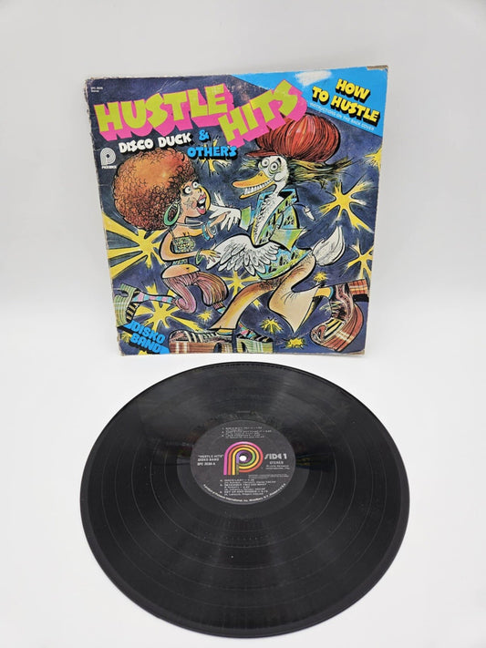 HUSTLE HITS, DISCO DUCK & OTHERS HOW TO HUSTLE LP SPC-3559 ORIGINAL 1976