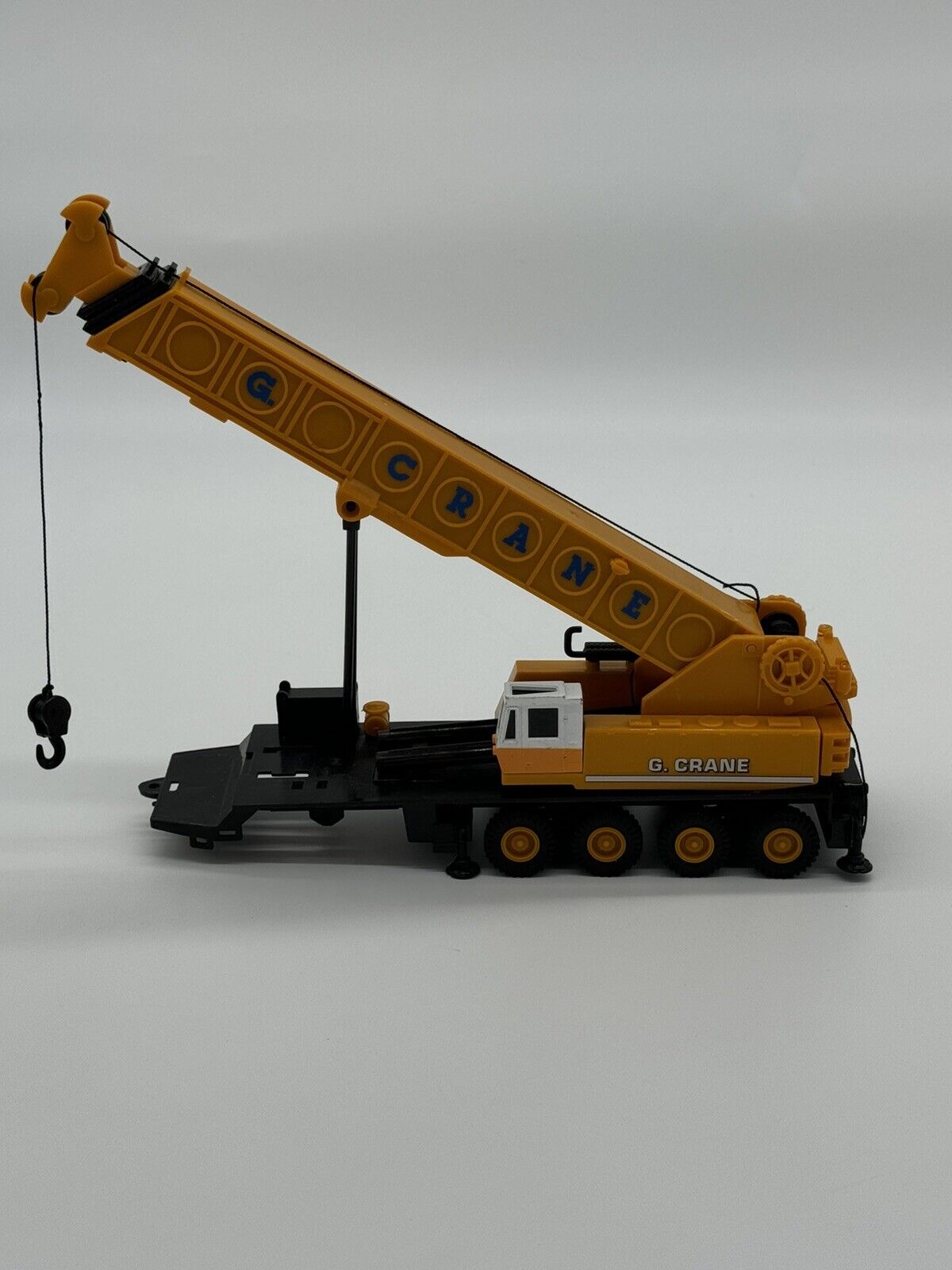 G Crane plastic toy model Yellow crane 11”