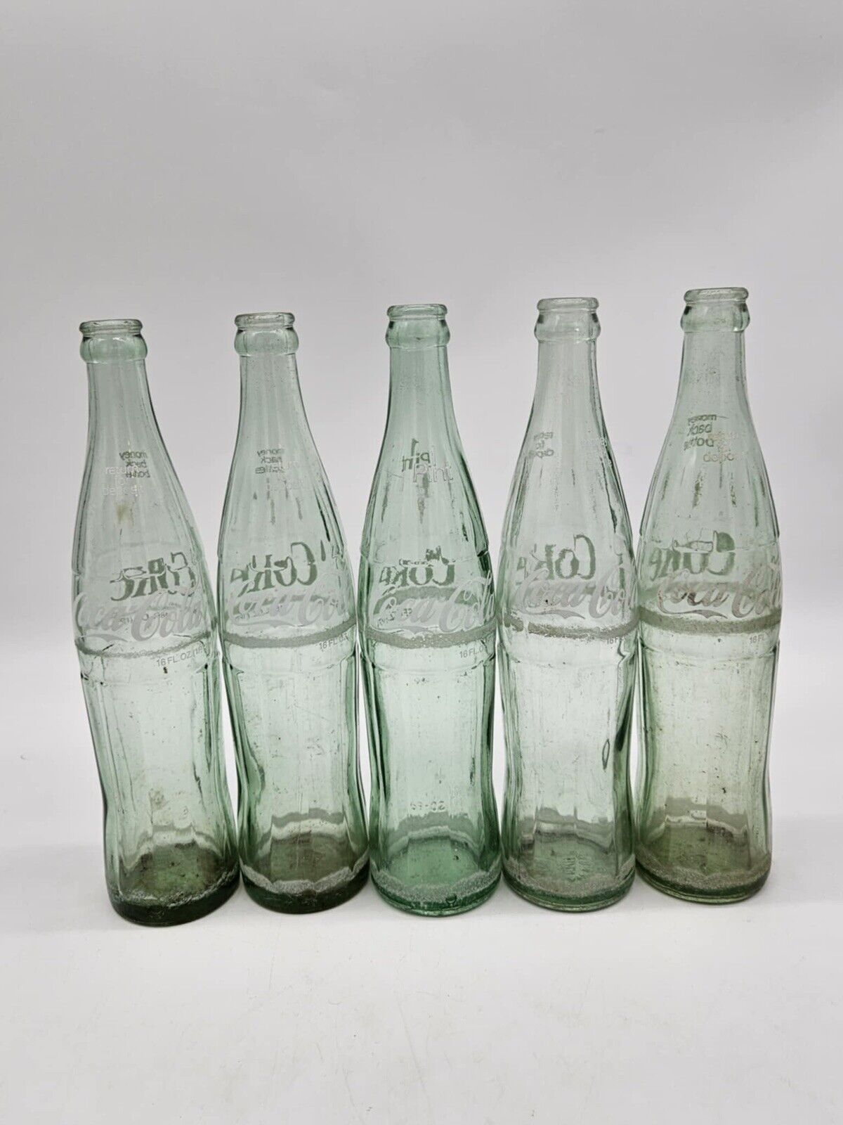 Lot of 13 Vintage 10oz. Coca-Cola 1960's Glass Bottles