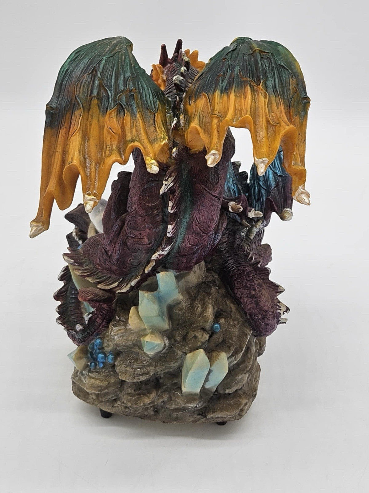 Green and Purple/Red Dragons Fighting over Lighted Orb of Power